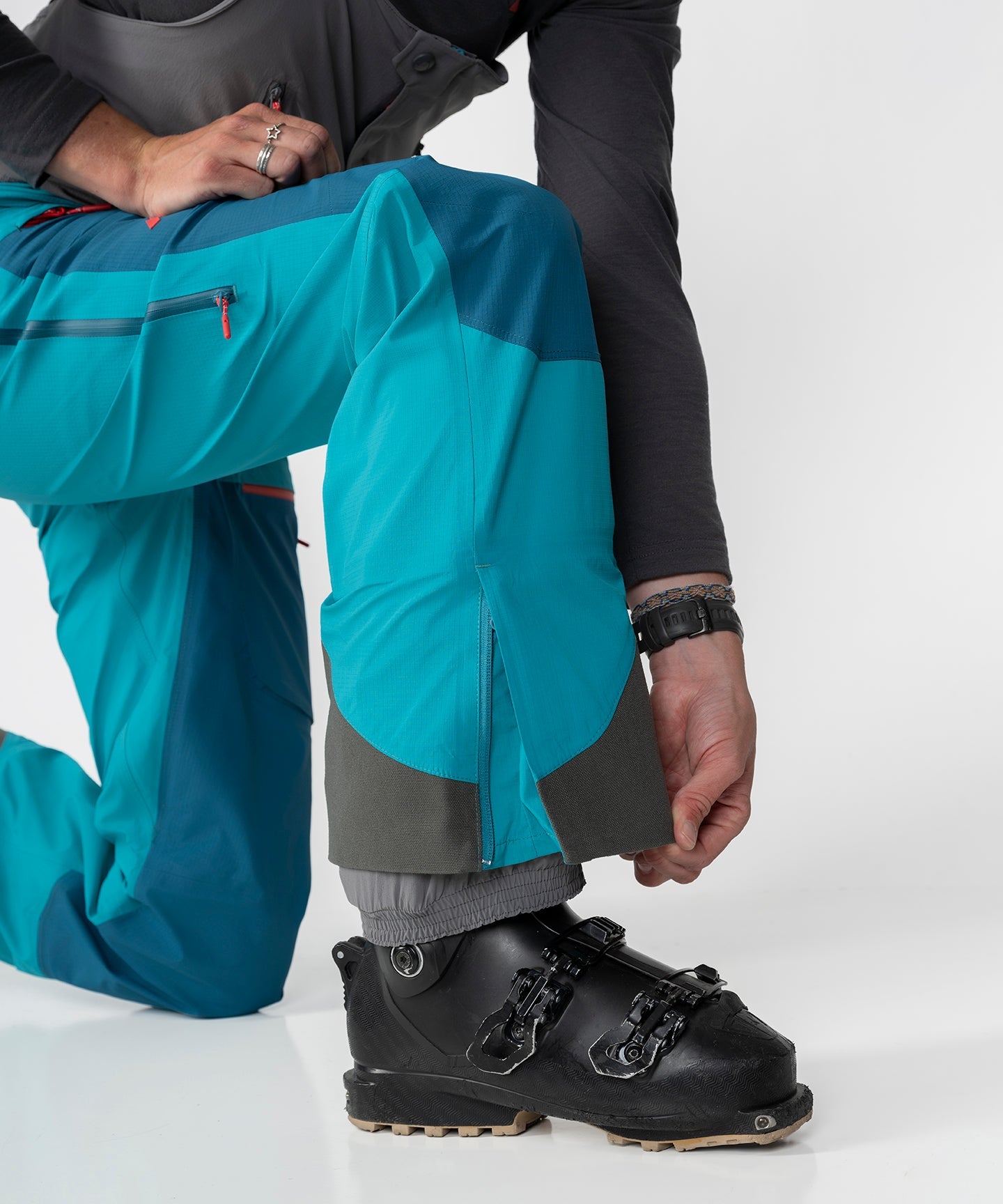 Strafe Outerwear Scarlett 3L Shell Bib pants in lagoon color, showcasing waterproof fabric and adjustable straps.