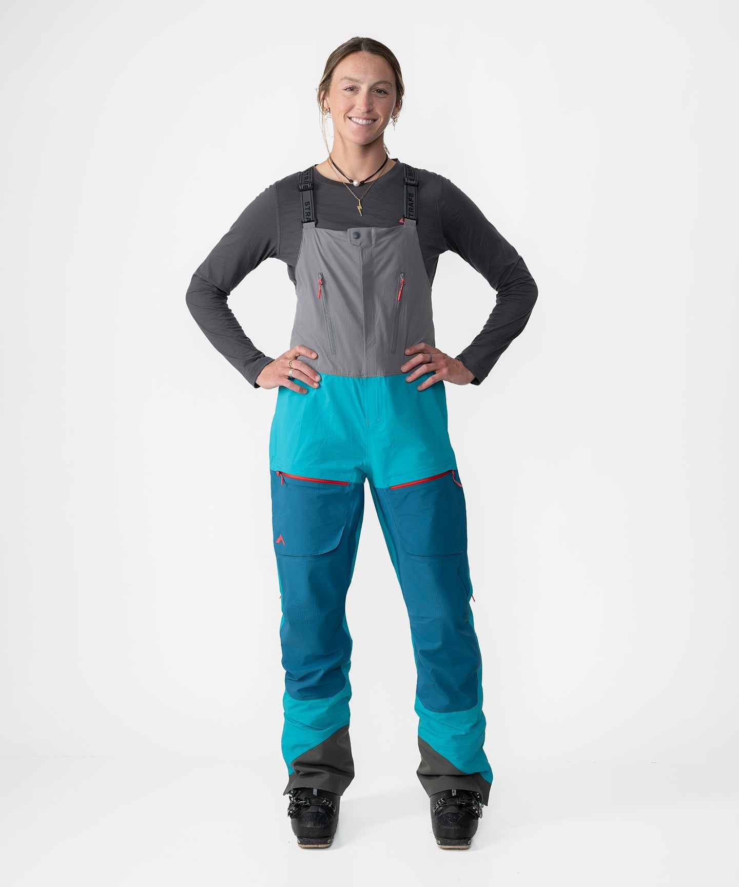 Scarlett 3L Shell Bib pants by Strafe Outerwear in lagoon color, showcasing a waterproof and breathable design.