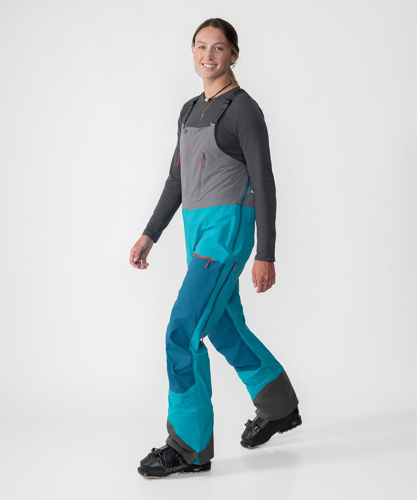 Scarlett 3L Shell Bib pants by Strafe Outerwear in Lagoon color, featuring adjustable straps and a waterproof design.