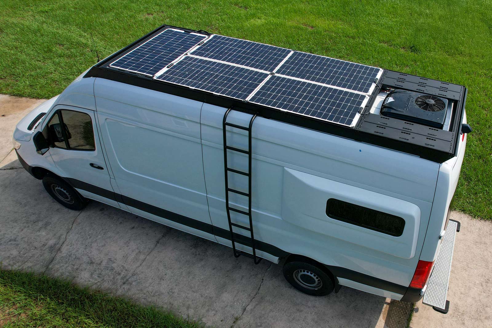 Orion Van Gear Sprinter Roof Deck Panels 2.0 with flush design installed on van roof for added storage and utility.