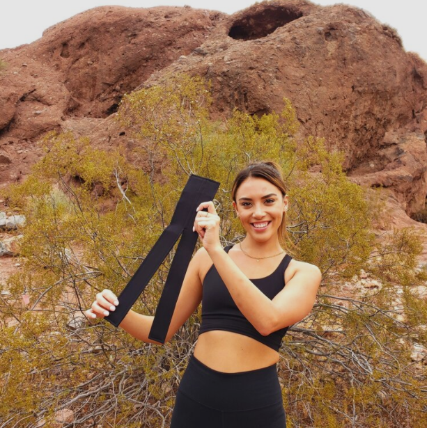 Ancient Trail WishBōn outdoor gear for center divided bladders, shown with adjustable straps and durable construction.