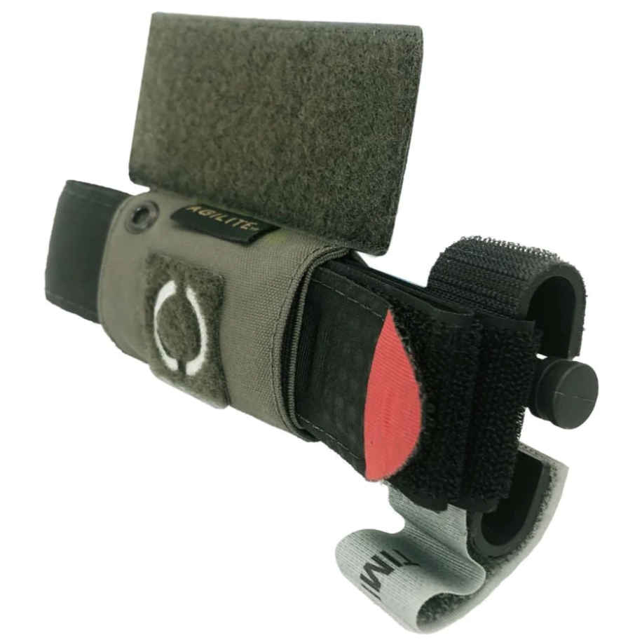HCC Tactical tourniquet holder attachment for tactical gear, black nylon with adjustable strap for secure fit.