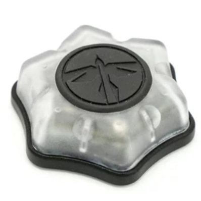 HCC Tactical multi-mode tactical marker light with wireless charging, showcasing its compact design and illumination features.