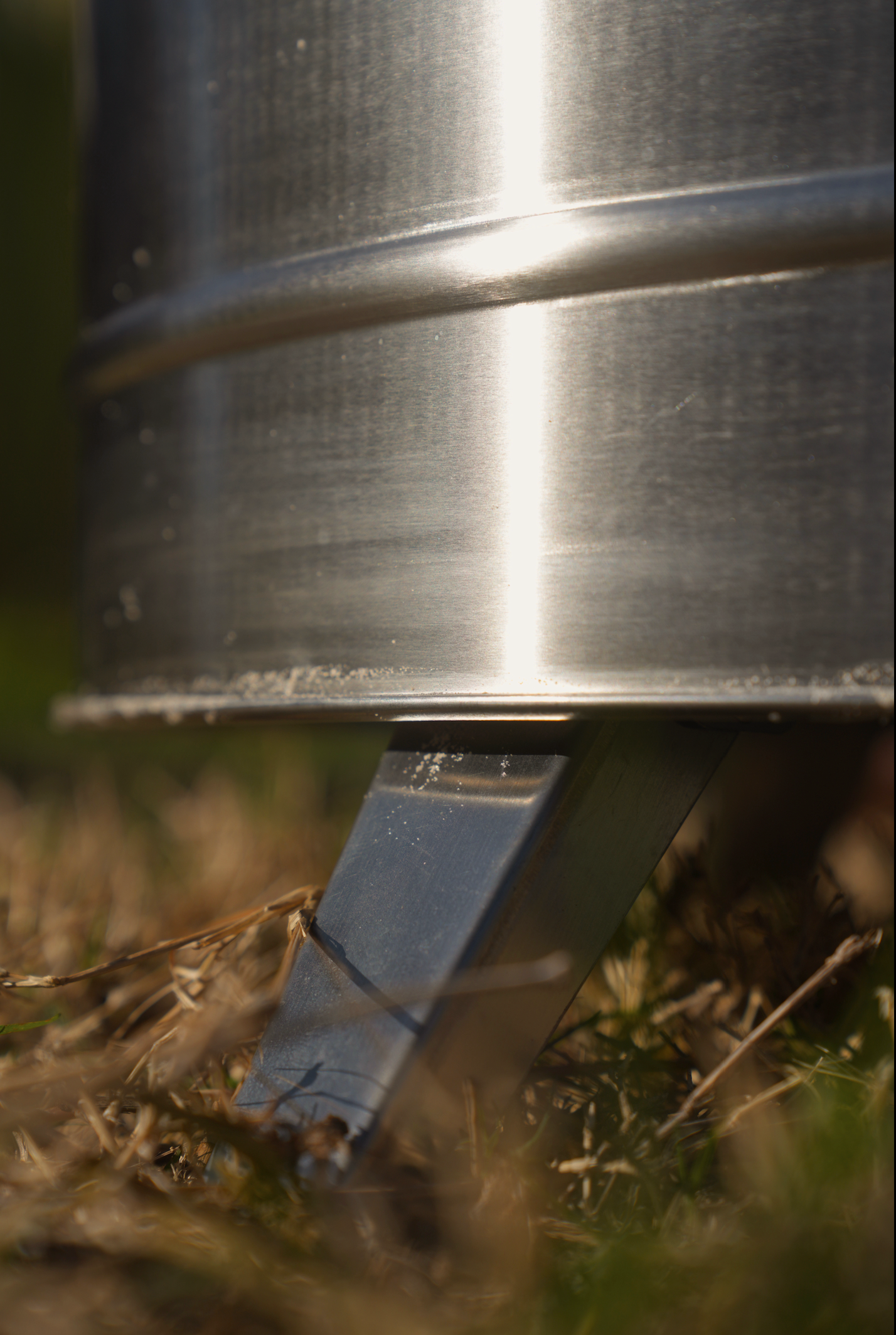 Large smokeless fire pit by North Shore Sauna with a modern design and open flame, ideal for outdoor gatherings.