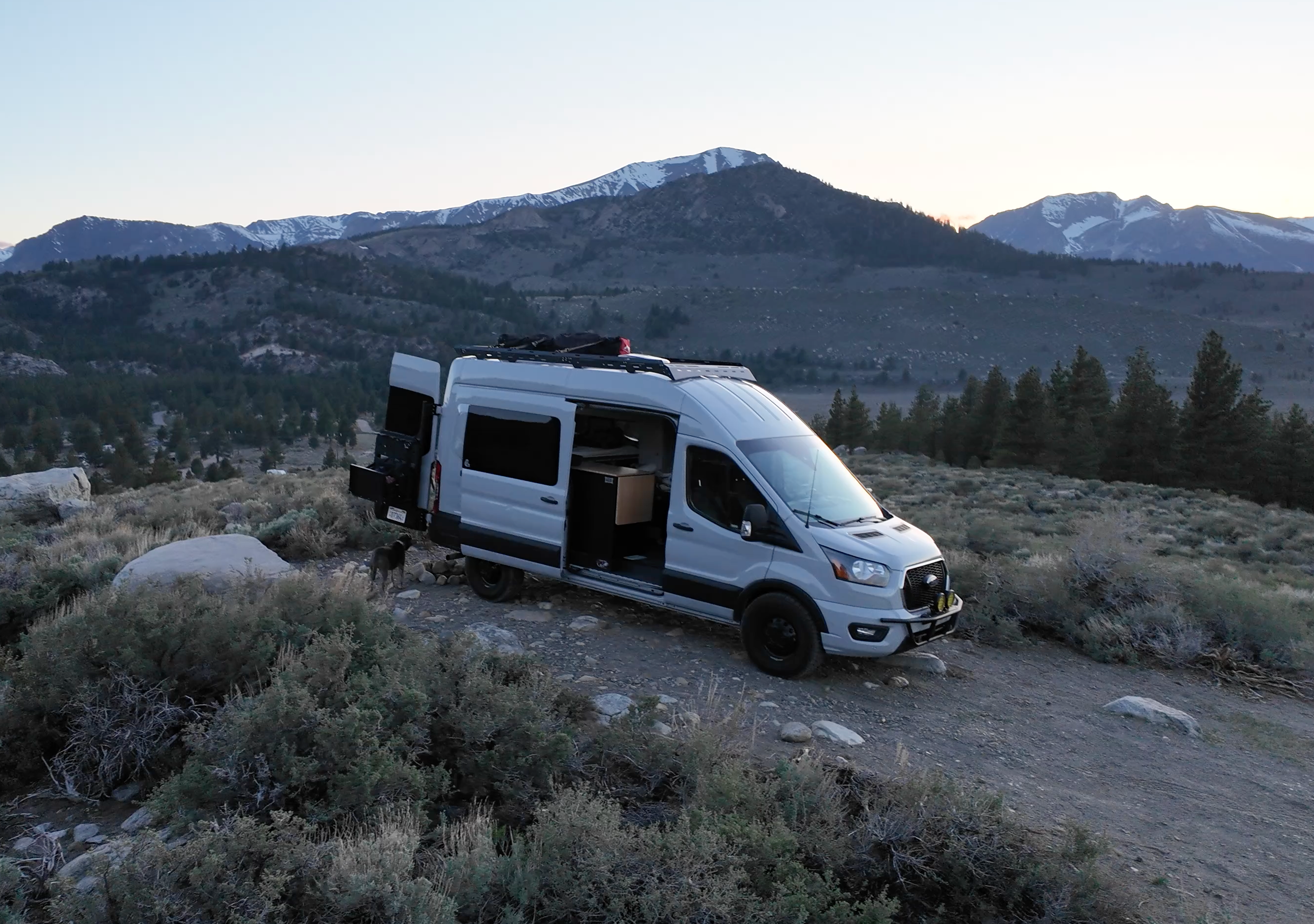 The Van Mart Transit Scout Rack 148 mounted on a vehicle, showcasing its sturdy design and functionality for transporting gear.