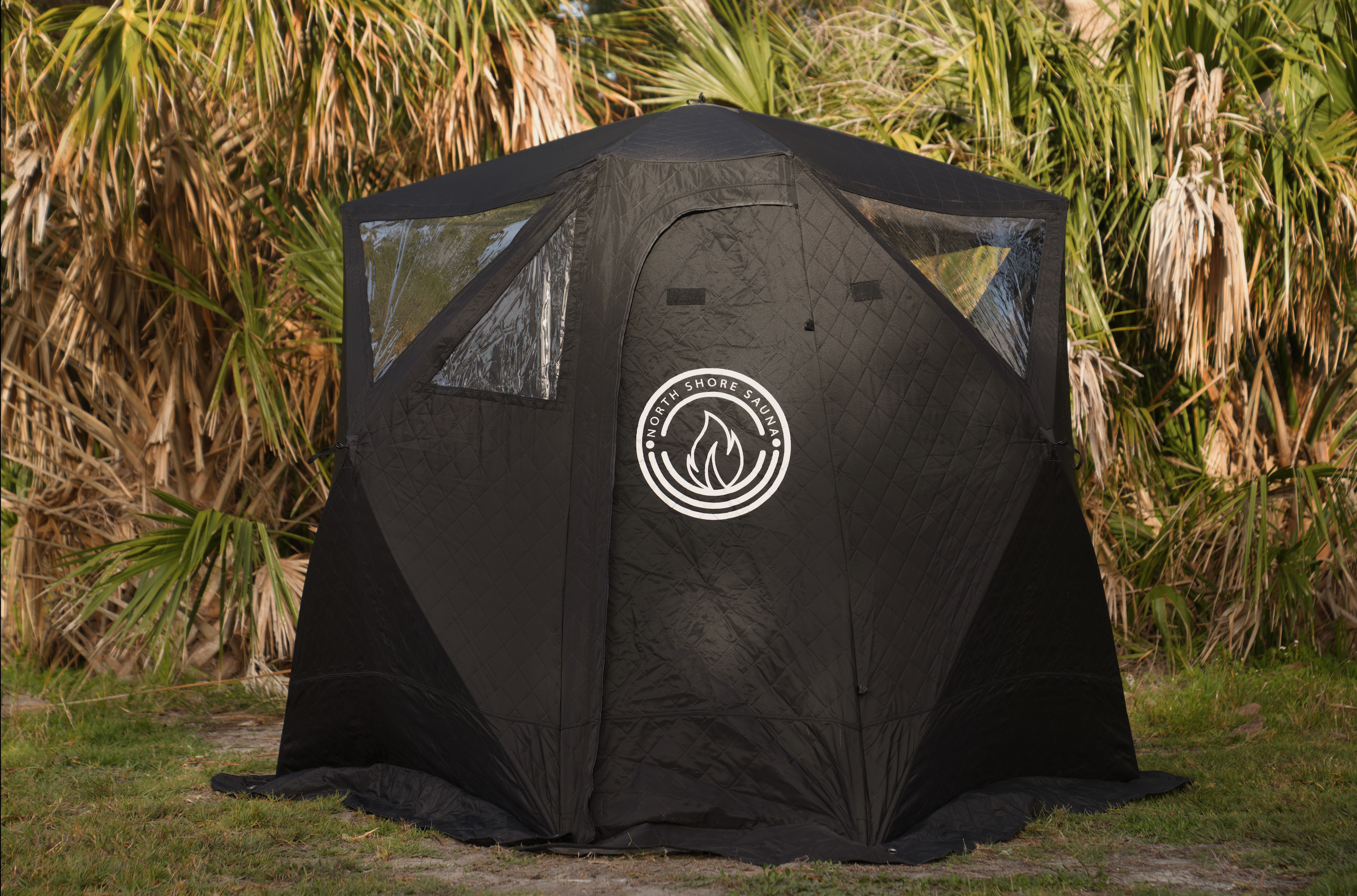 North Shore Sauna Nova 4 Sauna Tent for 4 people, showcasing the spacious design and durable fabric in the outdoors.