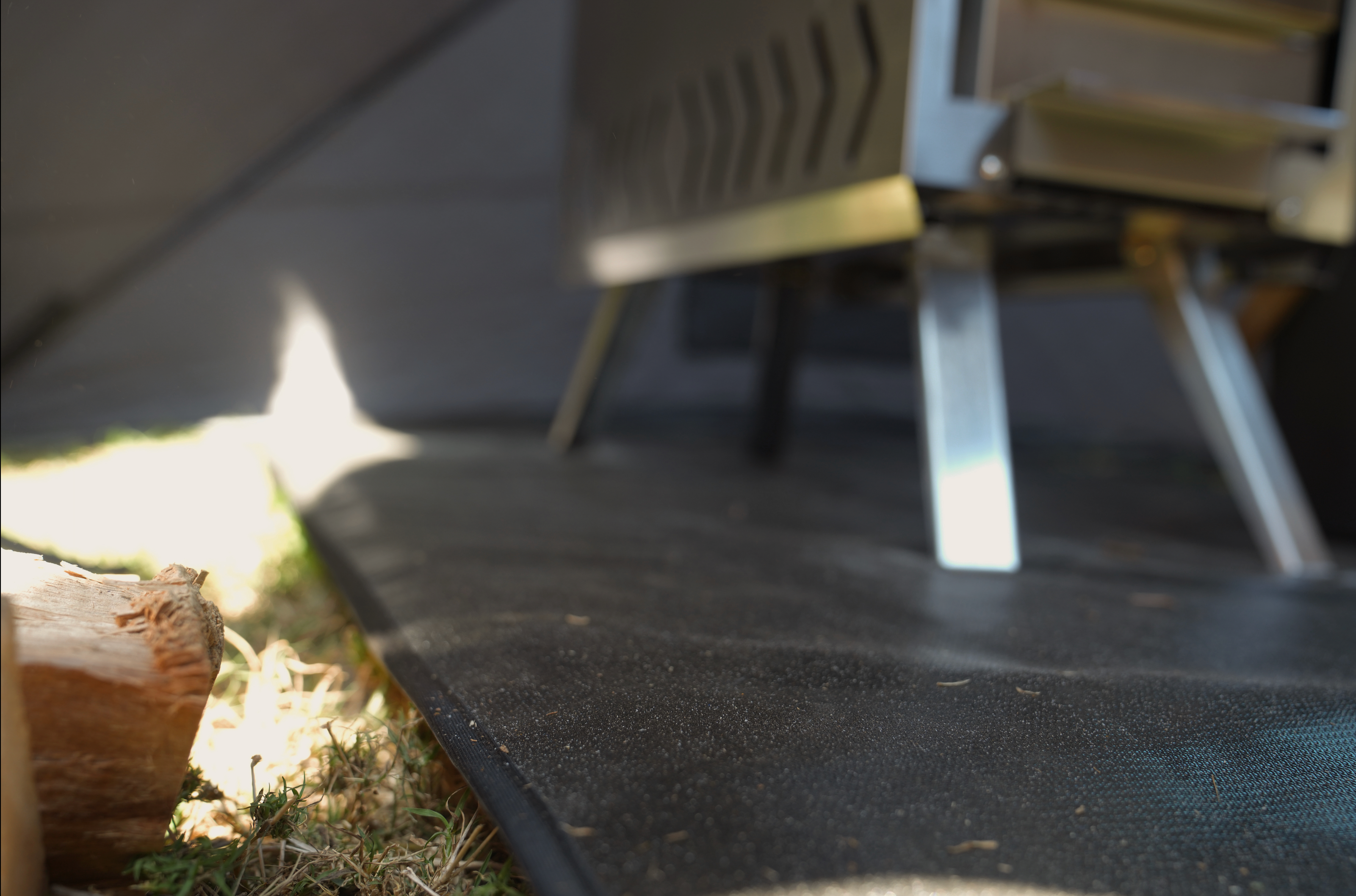 Durable fireproof mat by North Shore Sauna designed for sauna stove protection, showcasing heat-resistant material.