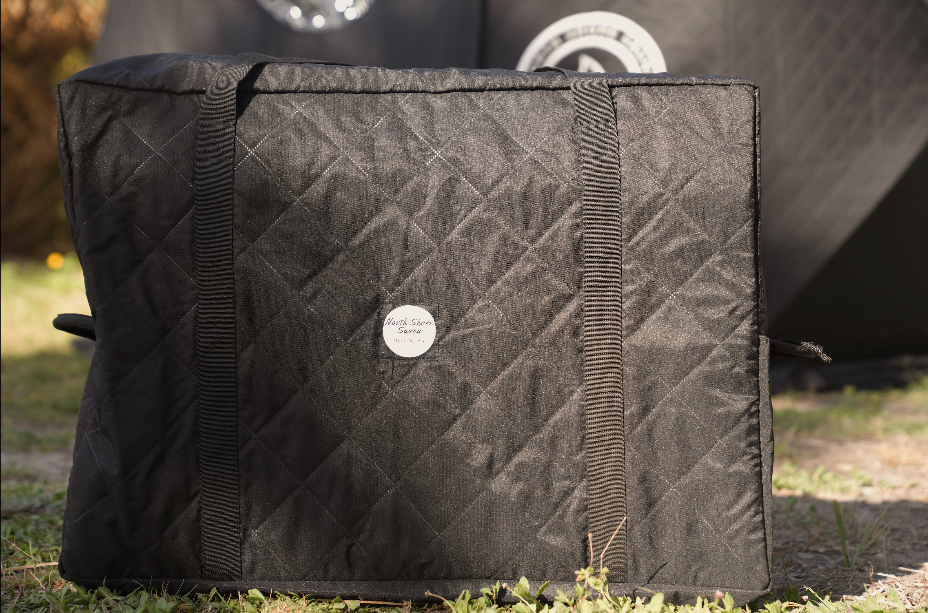 North Shore Sauna stove carrying bag, durable and portable storage for sauna stove transport and protection.