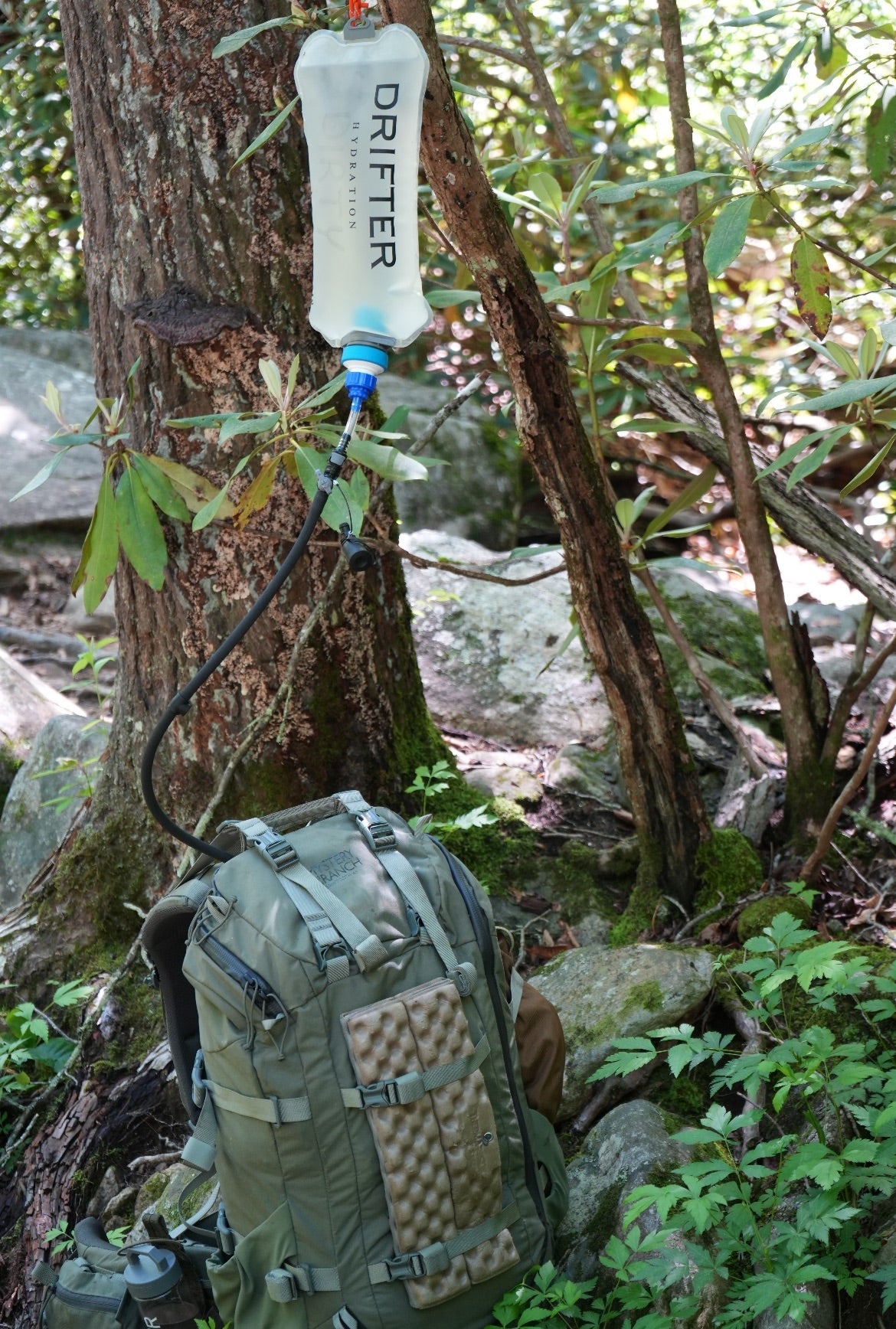 Drifter Hydration Transporter Water Bag with adjustable strap and durable material for portable hydration on the go.