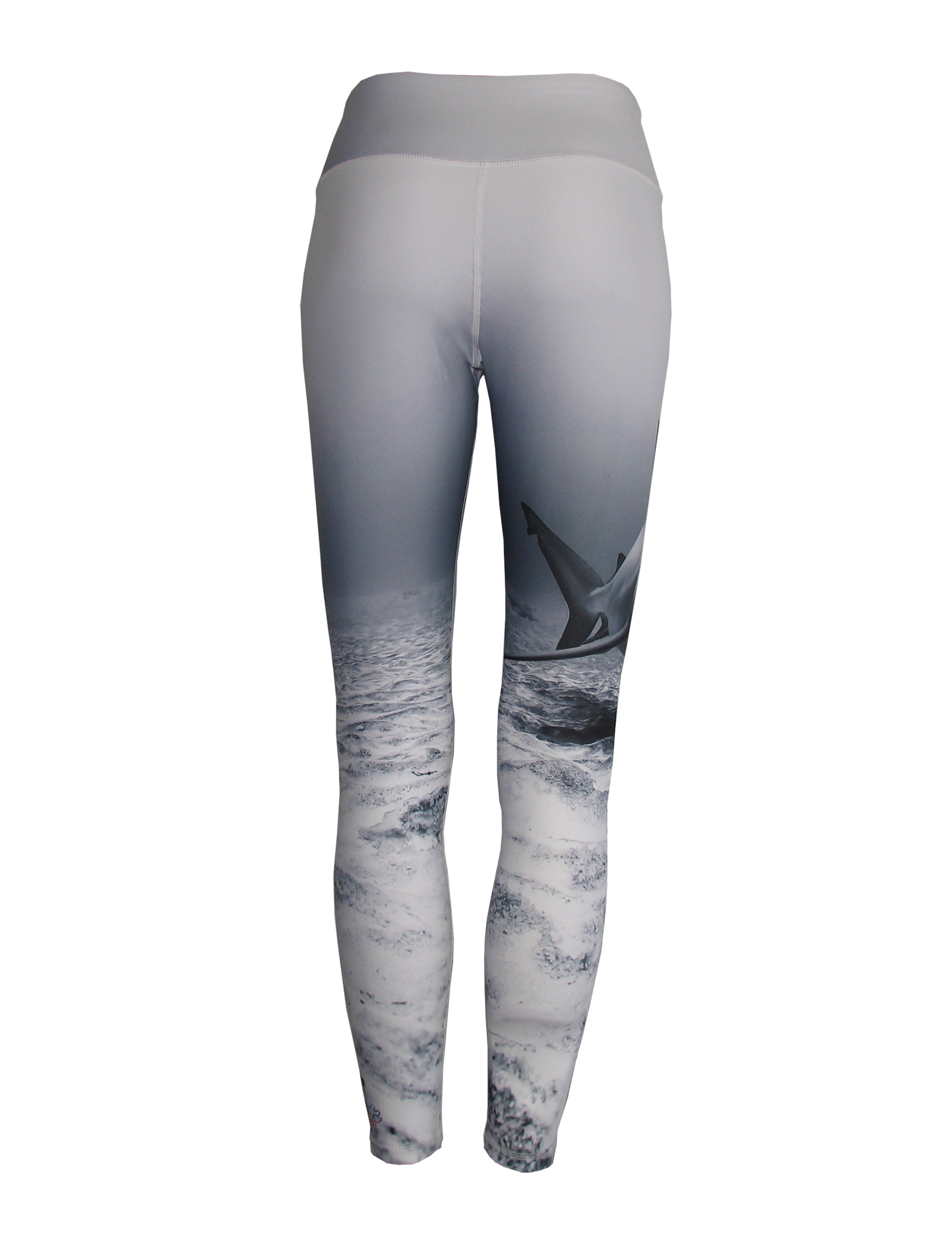 Back view of Shark Ocean print all sport leggings by Cognito Brands, Inc., featuring a vibrant shark and ocean pattern.
