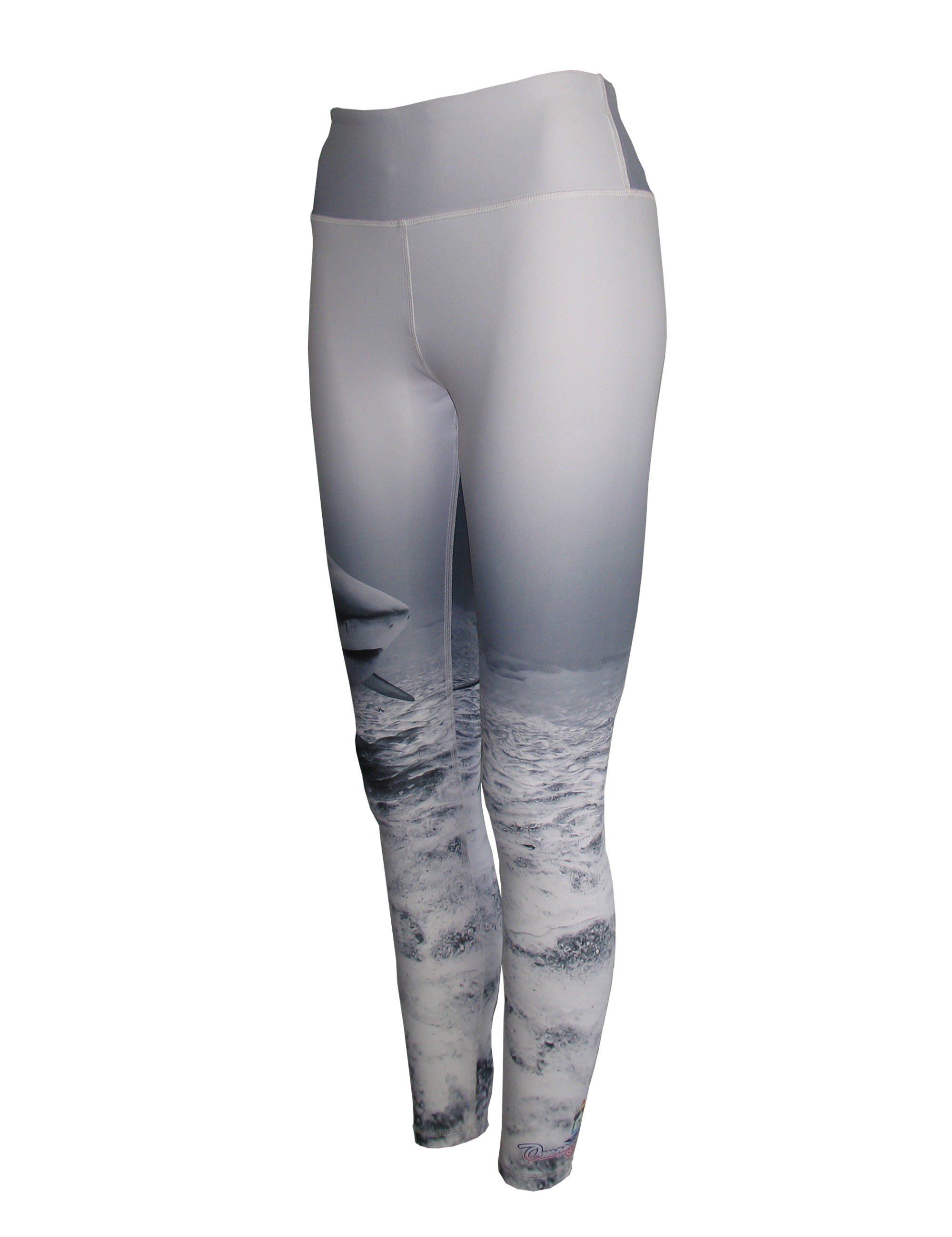 Cognito Brands Shark ocean print patterned all sport leggings shown from the side, featuring a vibrant shark design on stretch fabric.