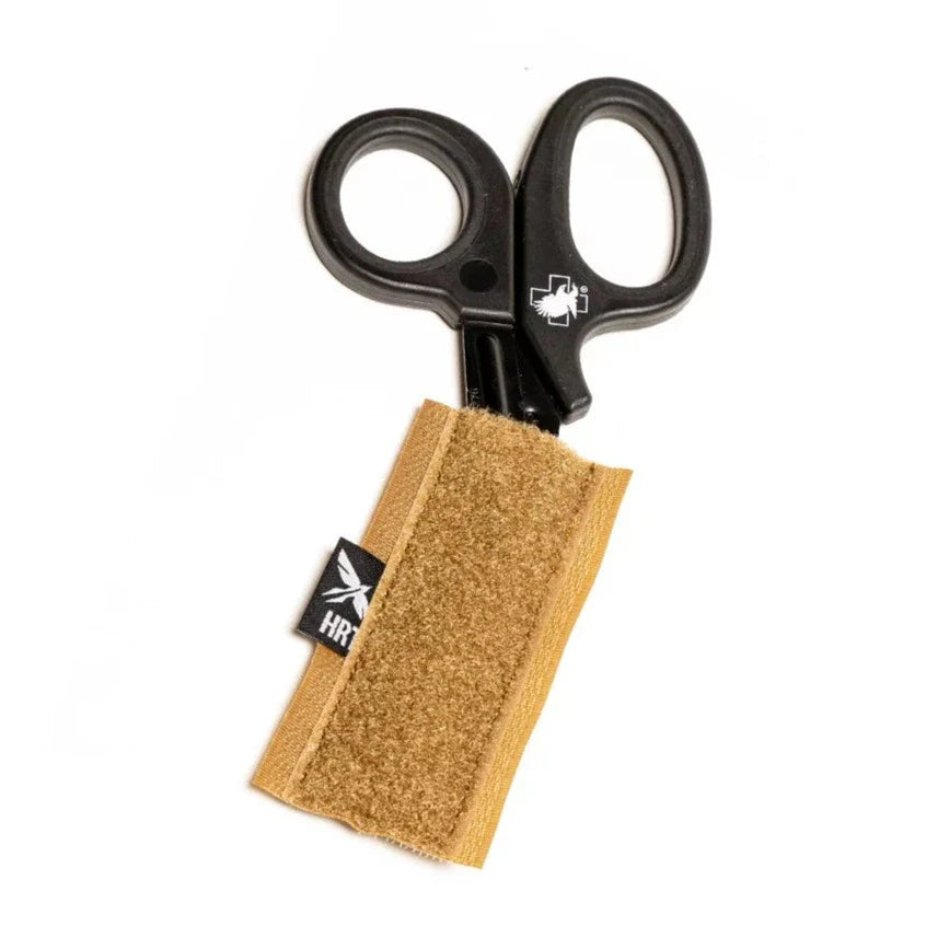 HCC Tactical universal shear holder pouch for medical shears, durable fabric with secure closure for medical professionals.