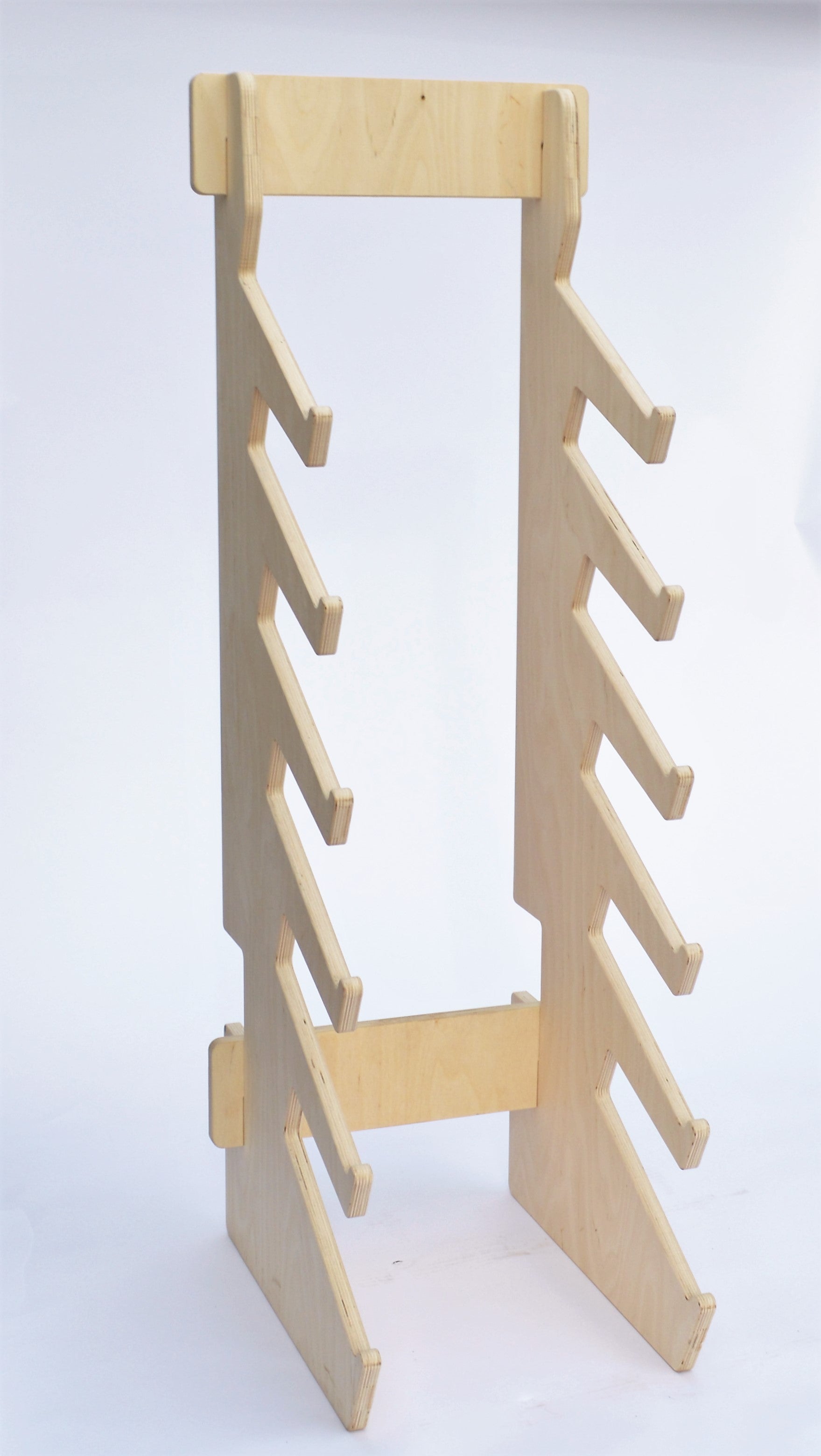 Rado Racks THE BOARDROOM skateboard floor rack holding multiple skateboards in a modern storage display.
