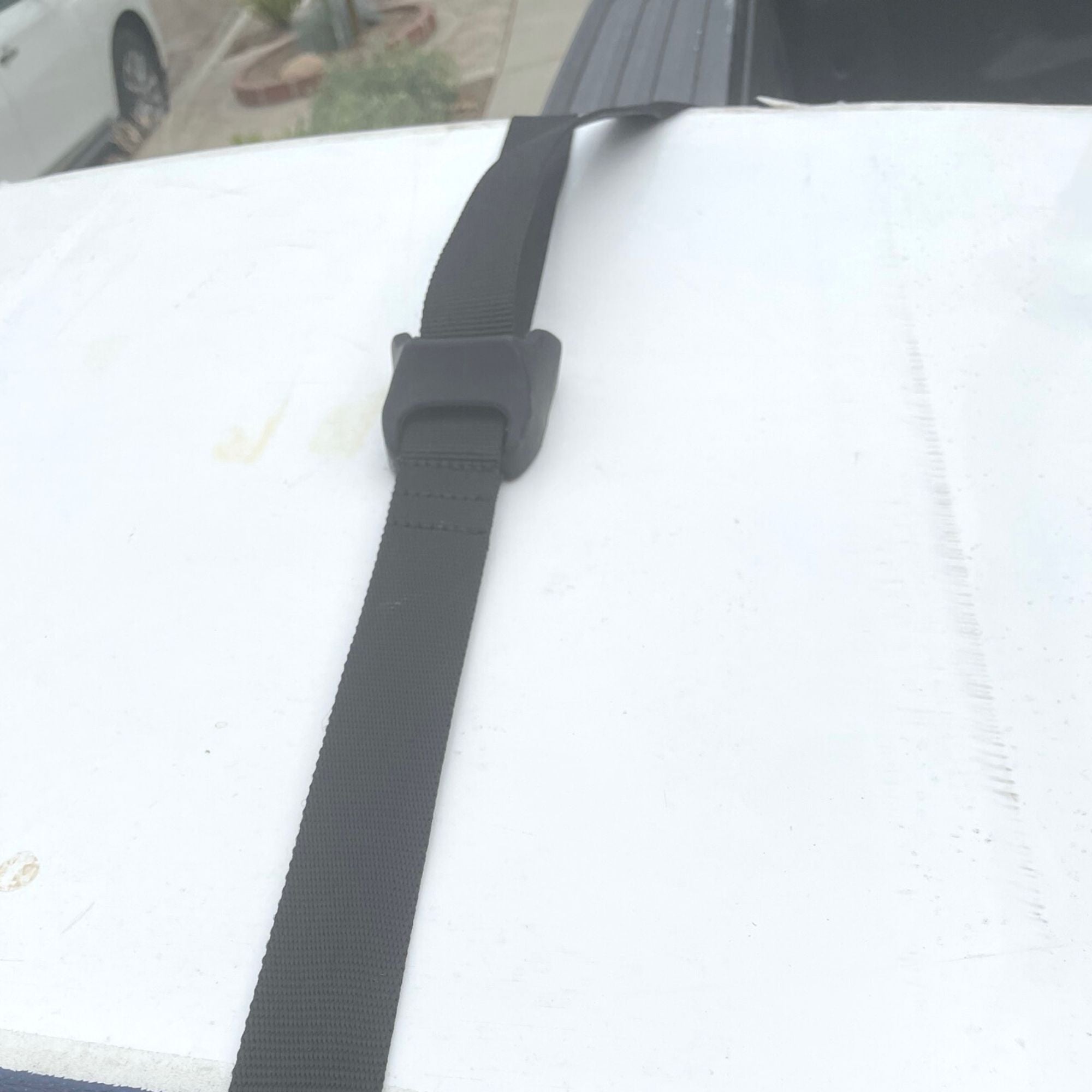 COR Surf tailgate truck pad with silicone cover for secure transport of surfboards and paddleboards on trucks.