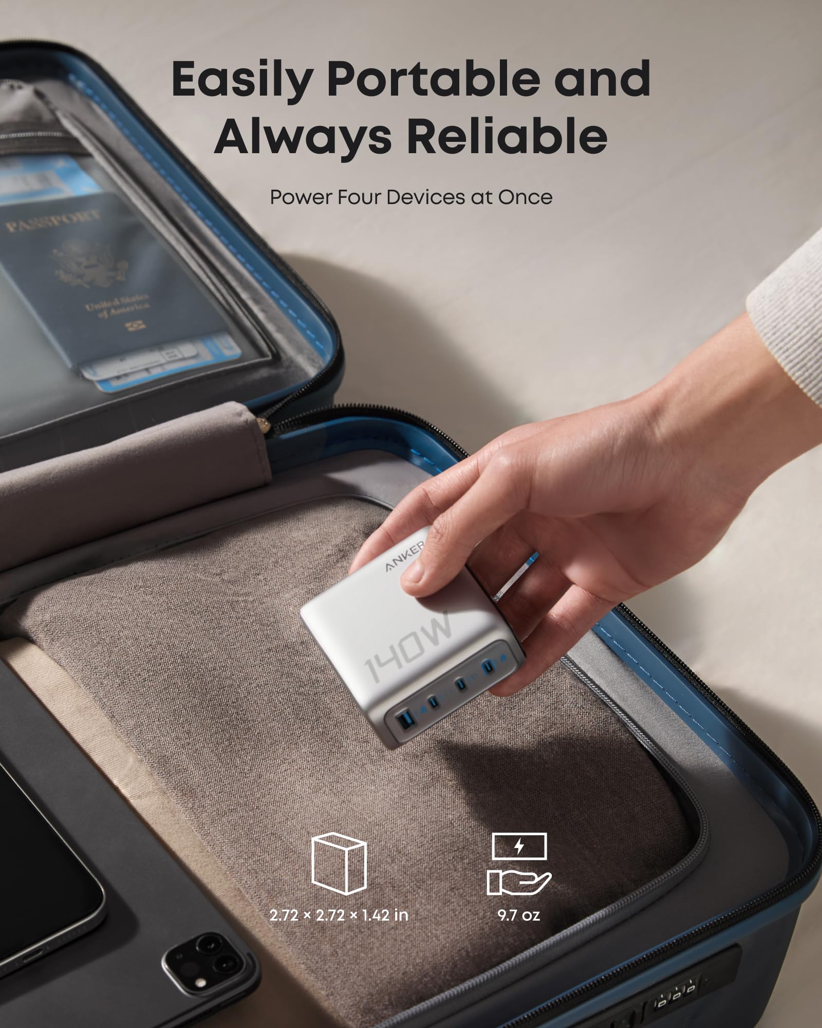 Silver Anker laptop power bank with built-in retractable cables, 25K capacity, and 165W power output for portable charging.
