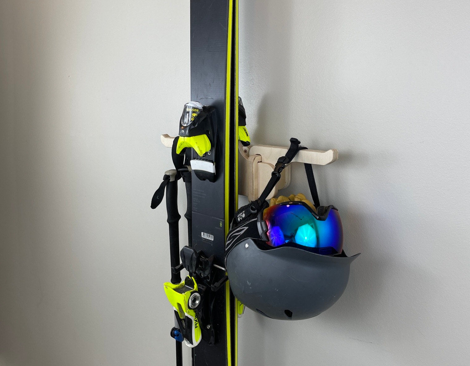 Rado Racks THE MOGUL ski storage rack showing a sleek black ski rack designed for organizing skis efficiently.