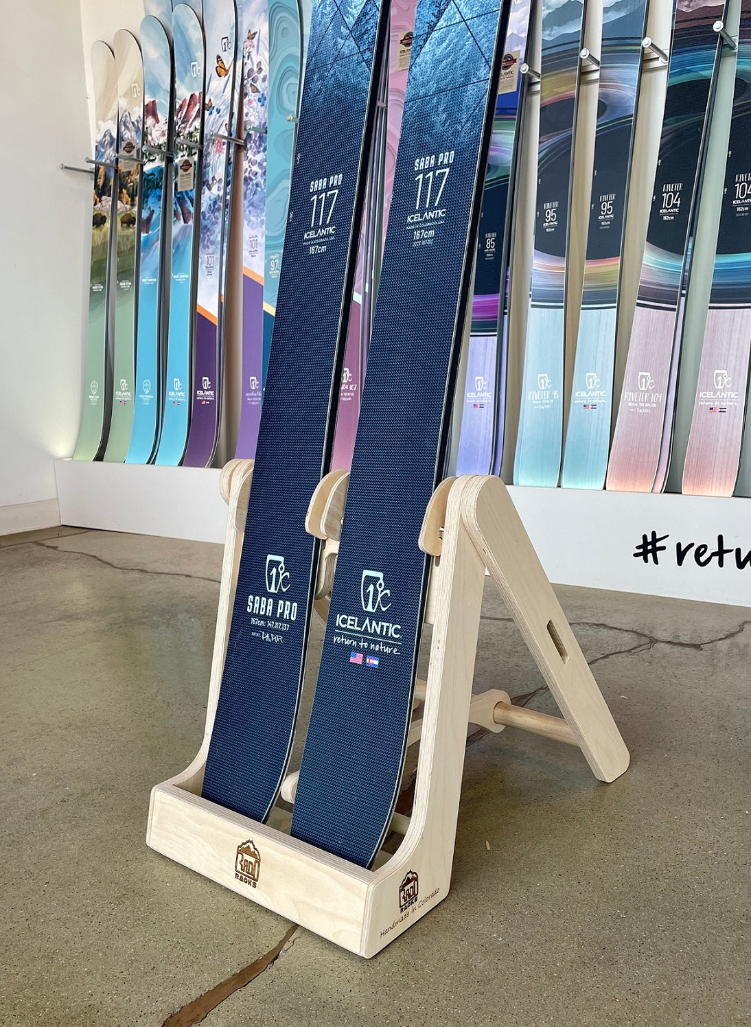 Rado Racks THE STASH ski display stand showcasing skis organized on a sturdy, sleek ski display rack for retail or storage.
