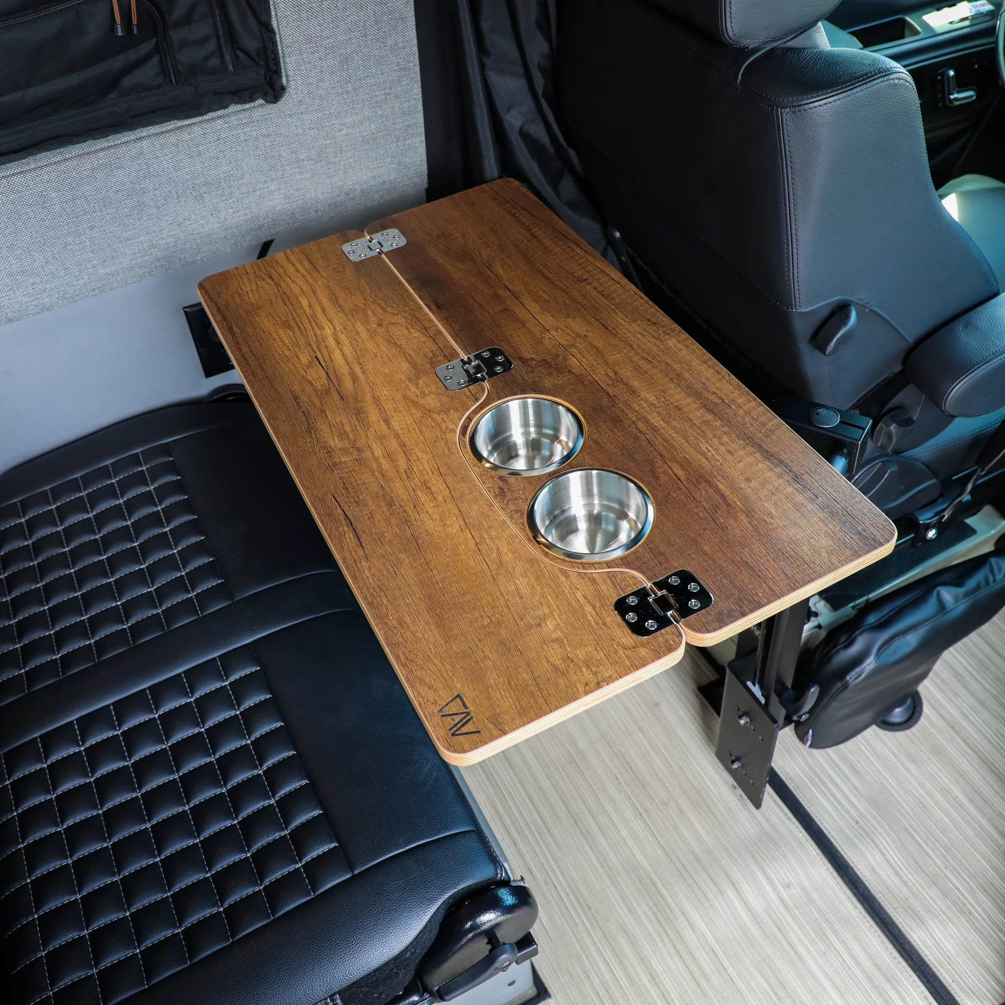 Canyon Adventure Vans Skinny 2.0 Folding Table Top in black, compact and portable for outdoor use, with a smooth surface and sturdy legs.