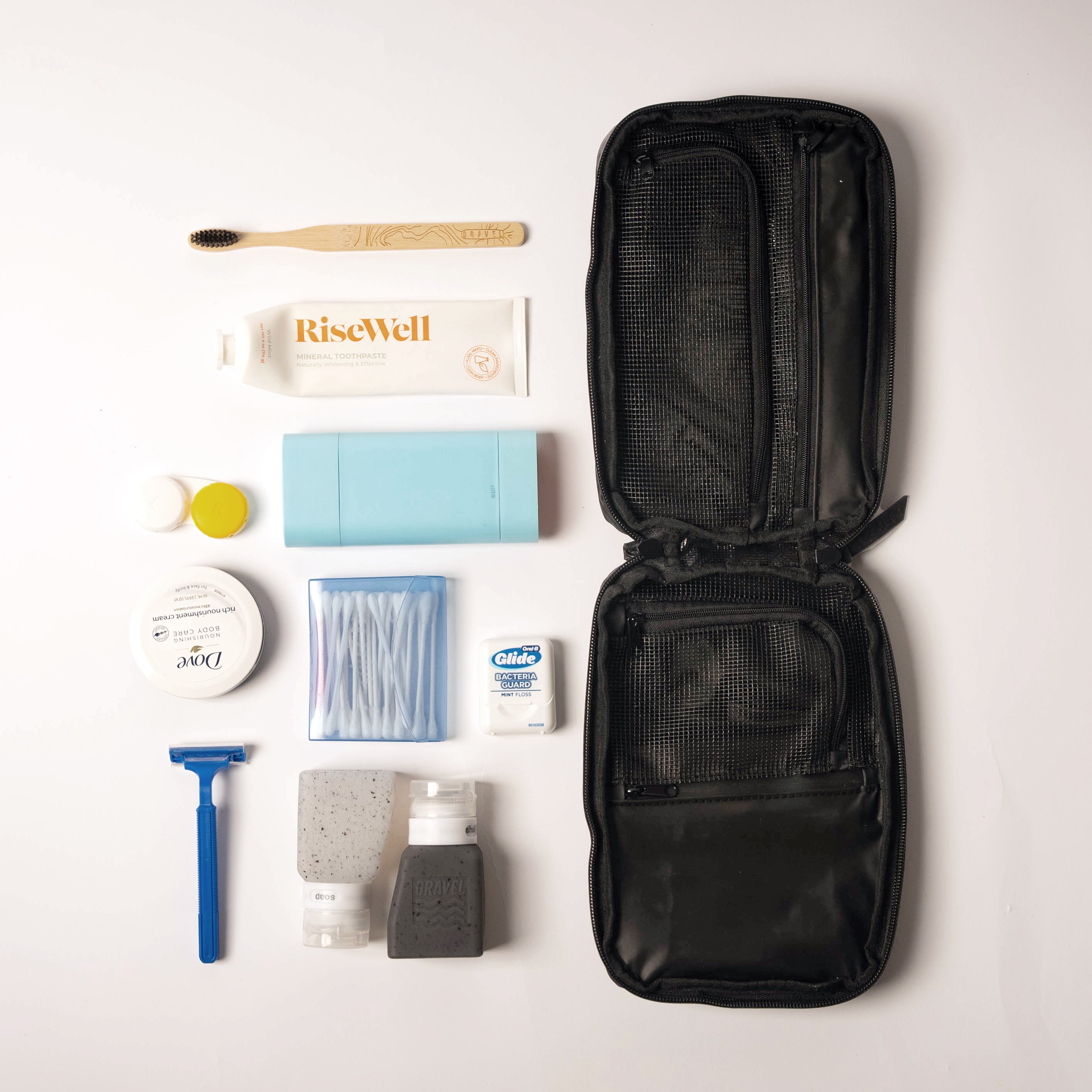 Gravel Slim™ Toiletry Bag with compact design, black nylon material, zipper closure, and multiple compartments for travel essentials.