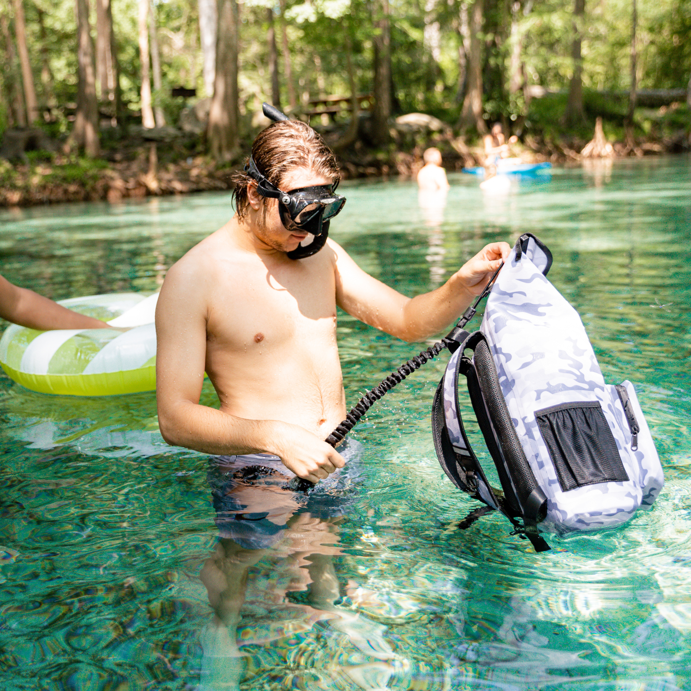 Snow camo waterproof floating dry bag by Dry Pocket, ideal for outdoor activities, keeps belongings dry and secure on water.