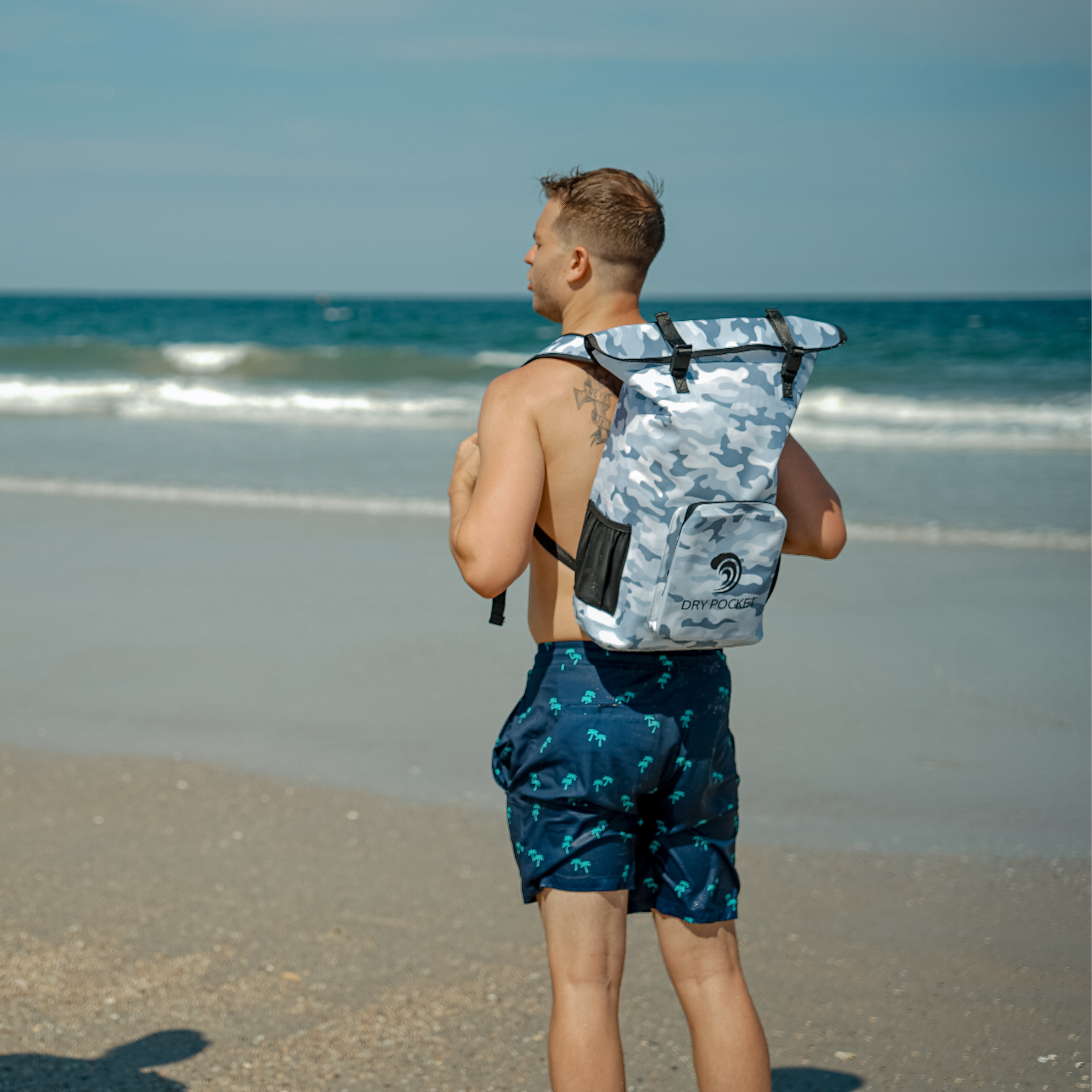 Snow camo waterproof floating backpack dry bag by Dry Pocket, designed for secure storage in outdoor and aquatic activities.