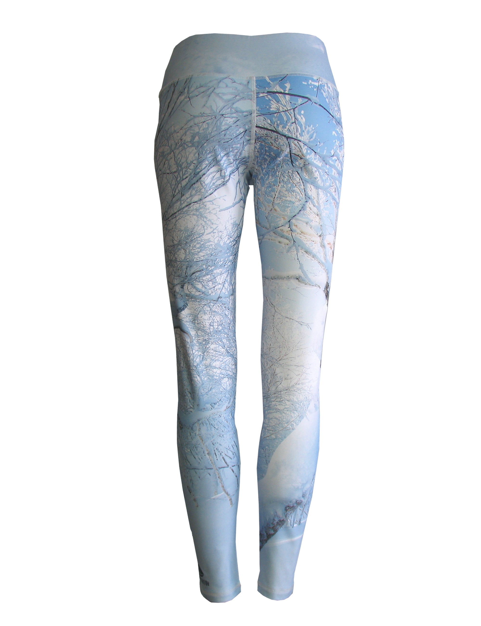 Back view of Snowcrossed Mountain print all sport leggings by Cognito Brands, Inc., featuring a vibrant mountain pattern design.