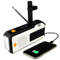 Black 4-in-1 NOAA weather band radio with solar, dynamo, and USB charging, featuring a built-in flashlight in a sleek design.