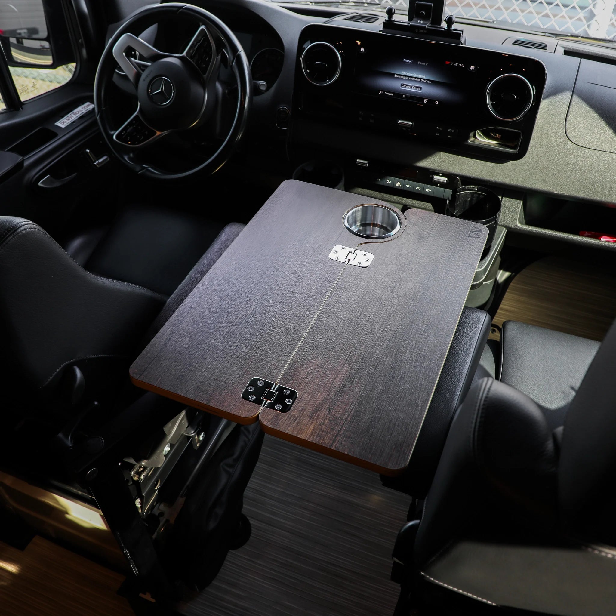 Canyon Adventure Vans Solo Folding Table Top, compact and portable, with a smooth surface and sturdy frame, perfect for outdoor use.