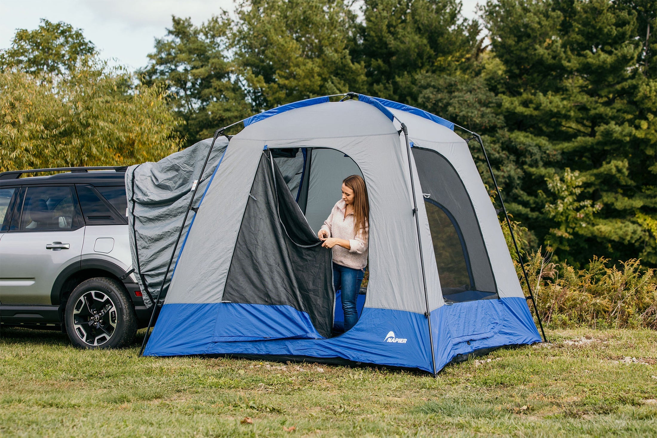 Backcountry Sportsman Sportz SUV Tent set up on a vehicle, showing spacious interior and weather-resistant fabric for outdoor camping.