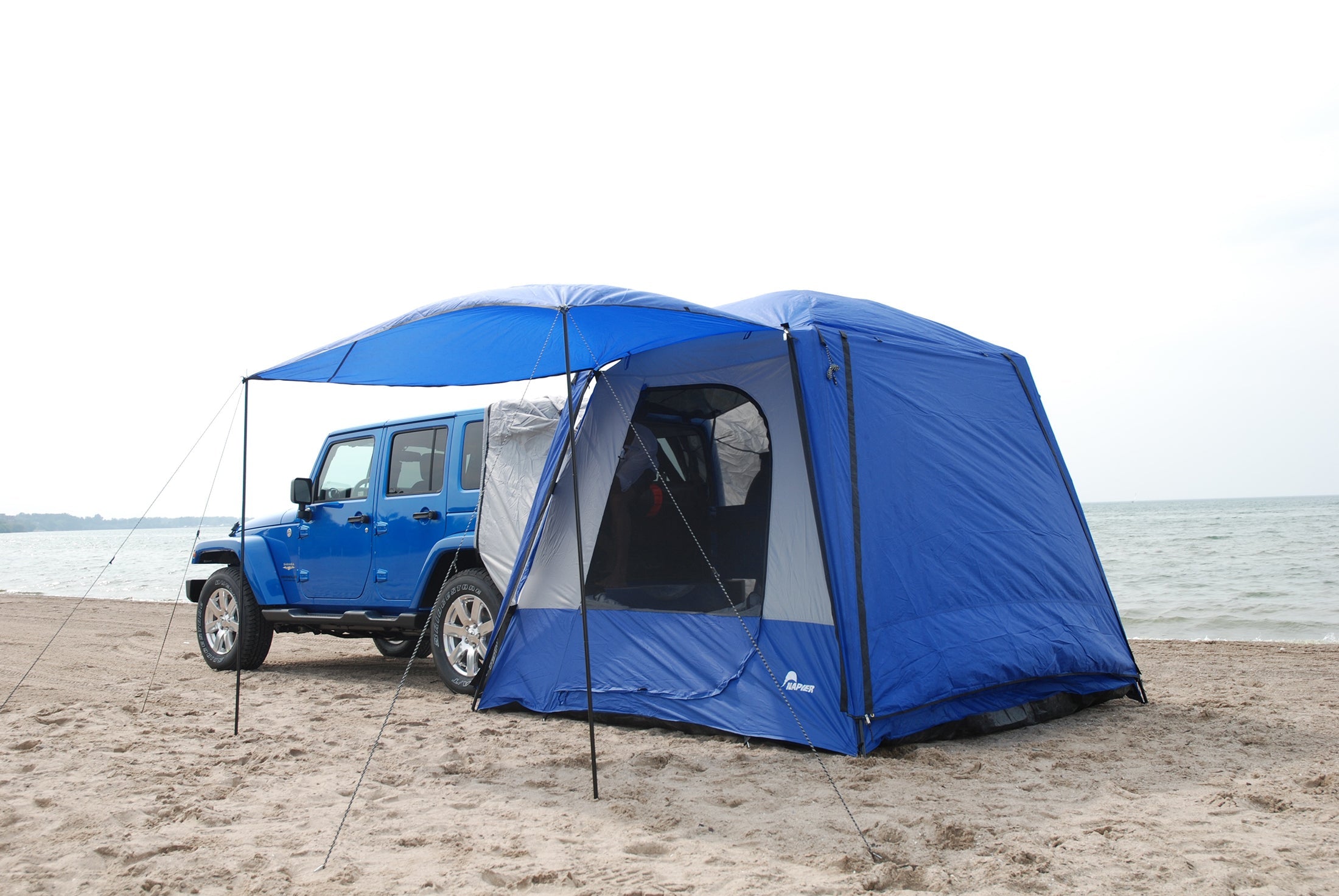 Backcountry Sportsman Sportz SUV Tent set up on a vehicle, showcasing its spacious design and durable fabric for camping trips.