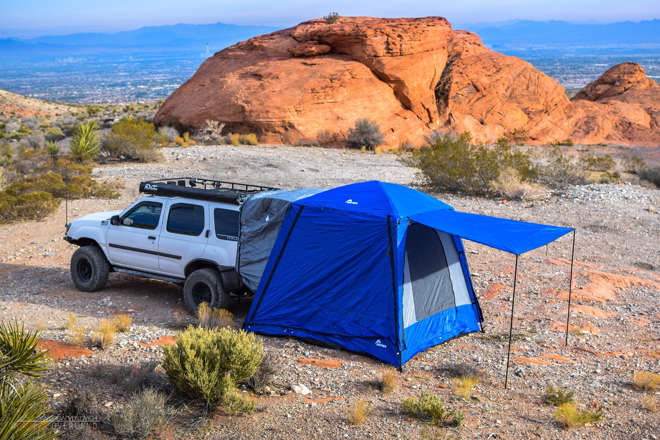 Backcountry Sportsman Sportz SUV Tent set up on a vehicle, showing its spacious design and weather-resistant fabric for outdoor camping.
