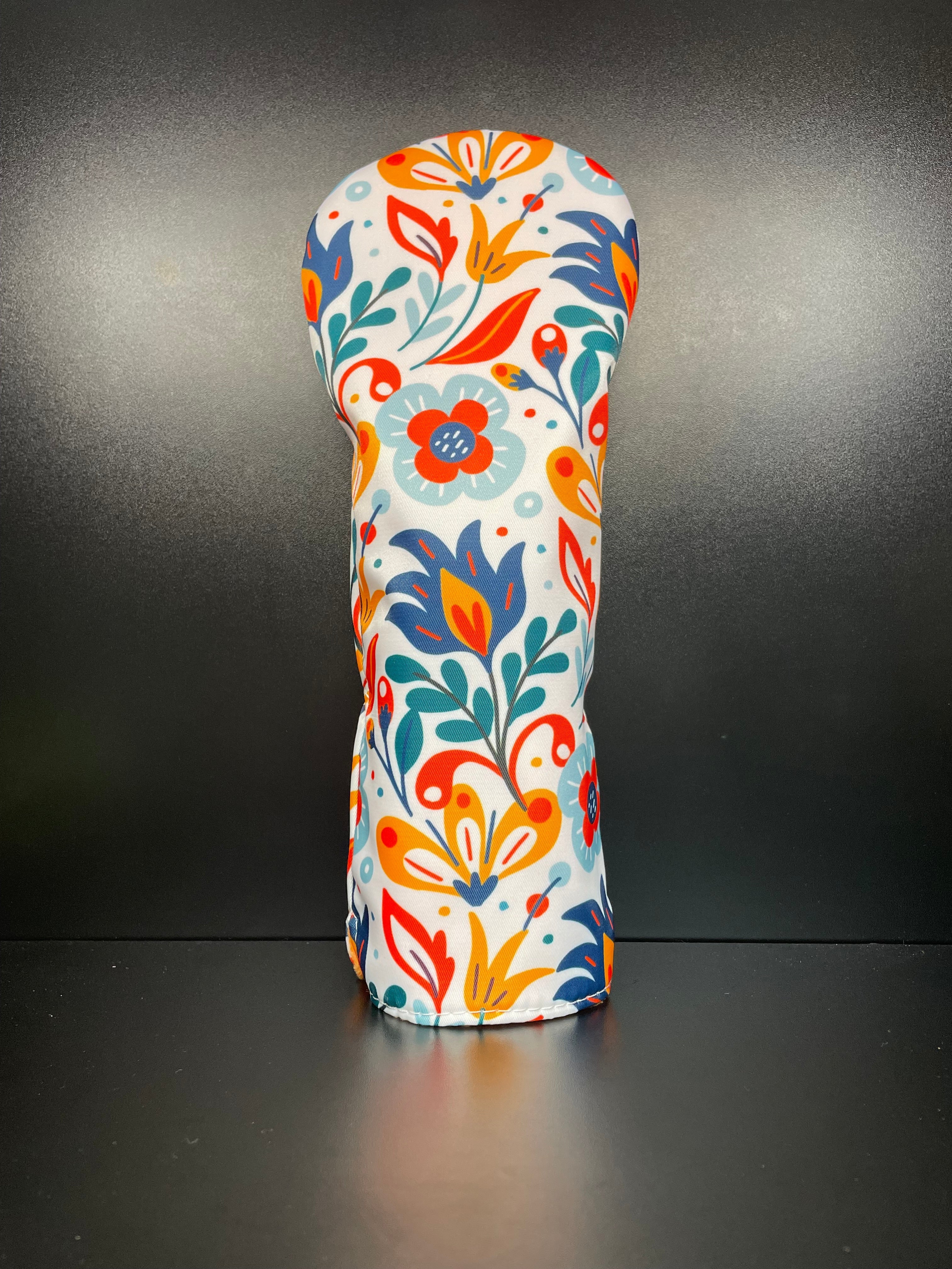 Spring flower golf club headcover by ParWestGolf featuring colorful floral design for protection and style.