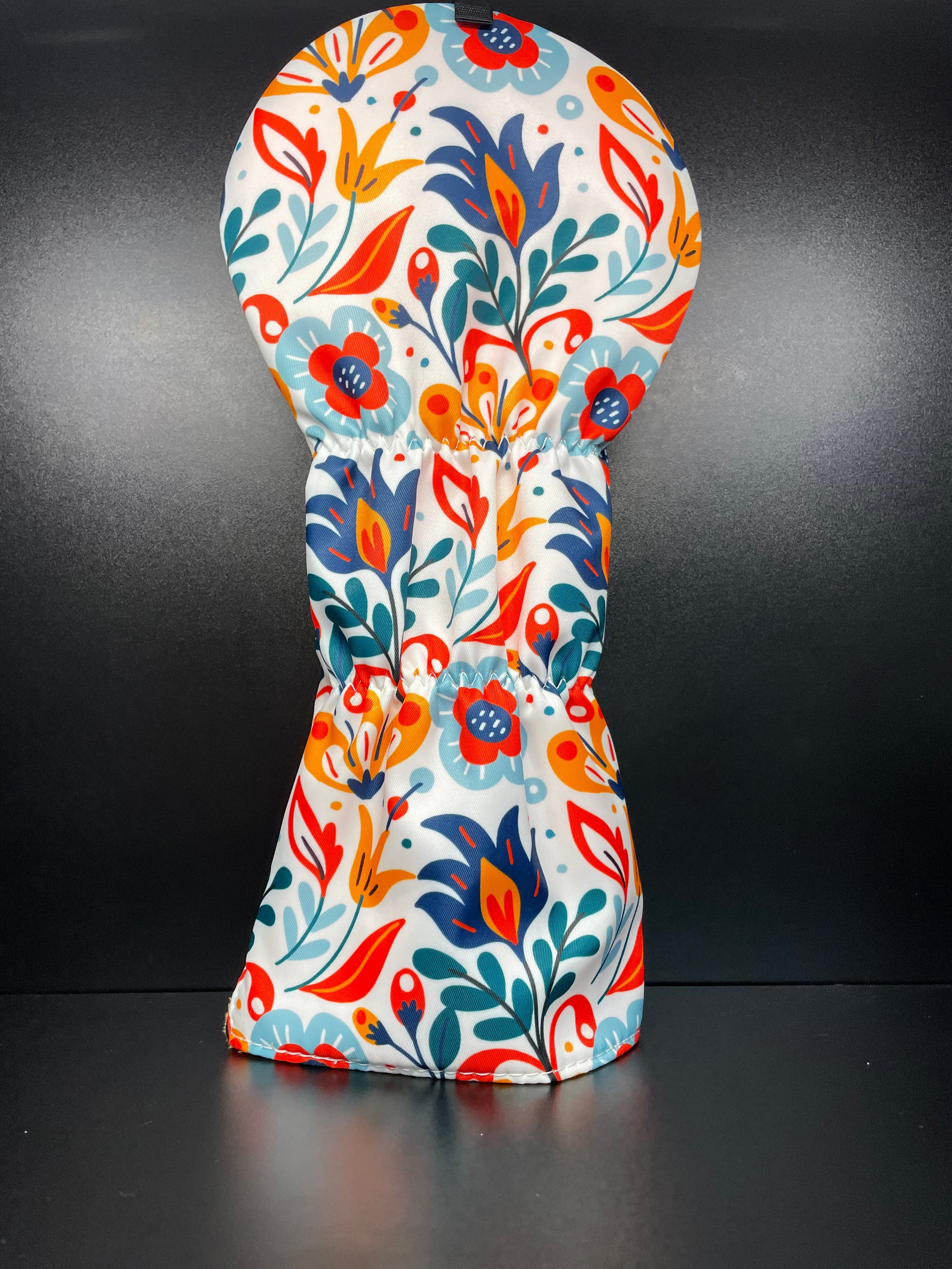 Spring flower golf club headcover by ParWestGolf featuring a colorful floral design for protecting and decorating golf clubs.