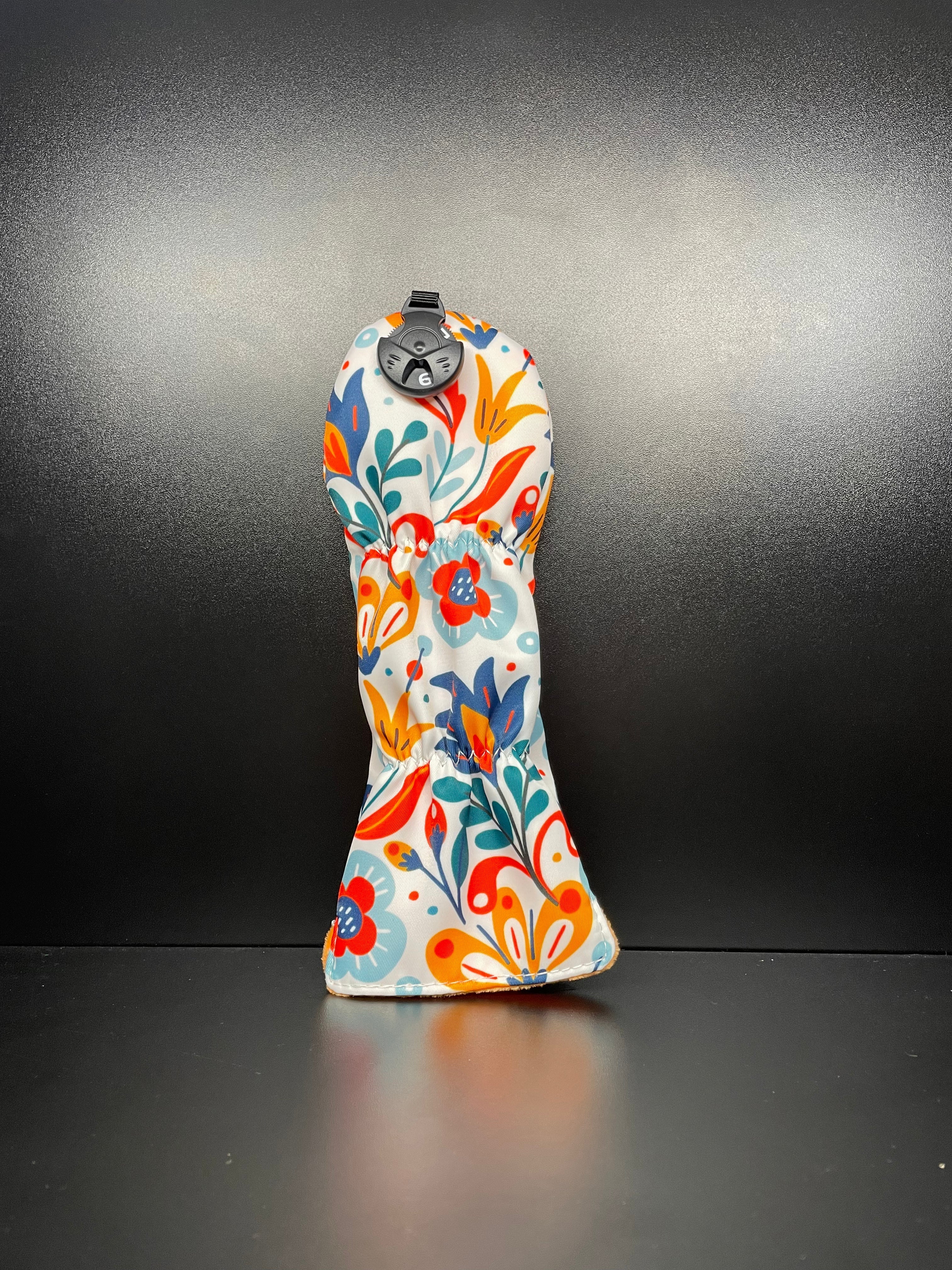 Spring flower golf club headcover by ParWestGolf featuring vibrant floral design for protection and style on the course.