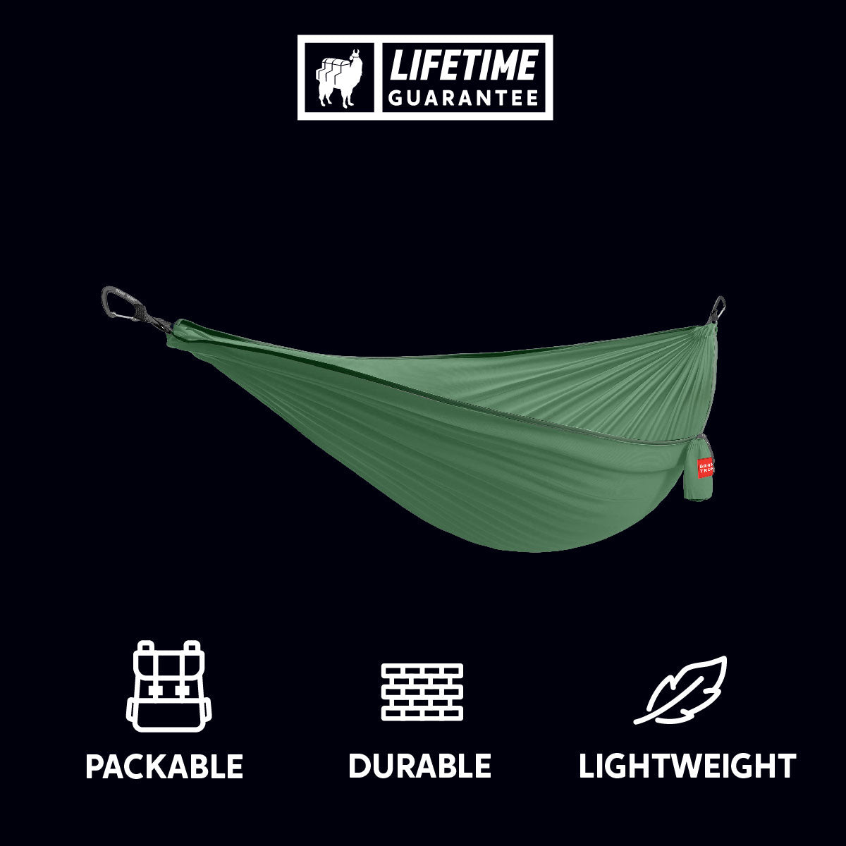 GrandTrunk ultralight starter hammock in green, showcasing its lightweight fabric and compact design for outdoor relaxation.