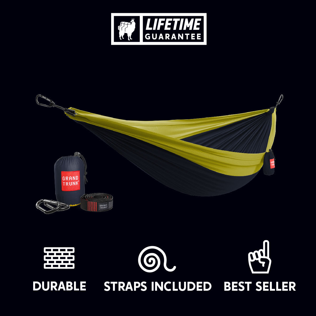 Double Deluxe Hammock by GrandTrunk with attached straps, shown hanging outdoors with vibrant fabric and sturdy support ropes.
