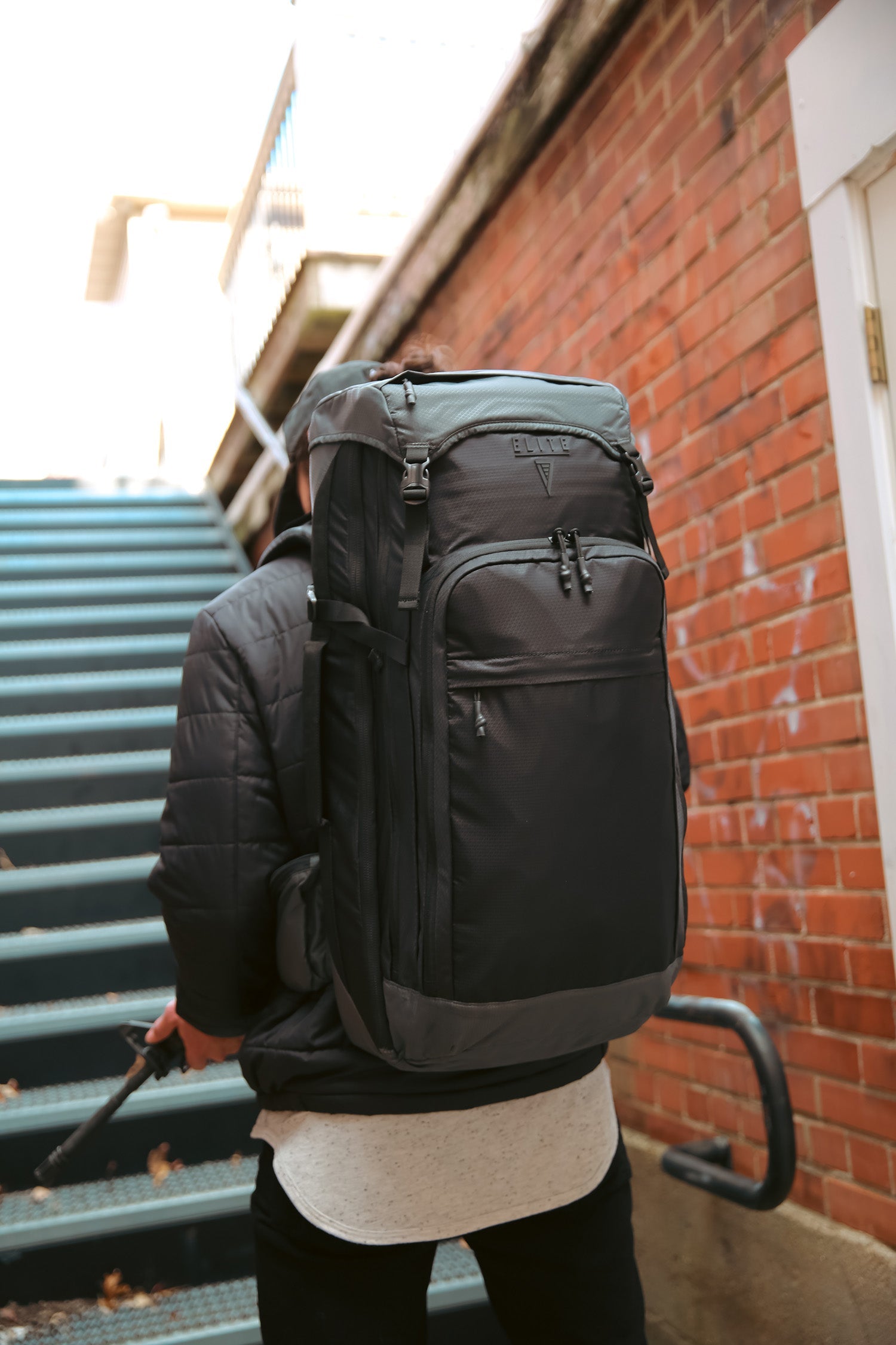 Elite Survival Systems Summit discreet rifle backpack with adjustable straps and multiple compartments for secure firearm storage.