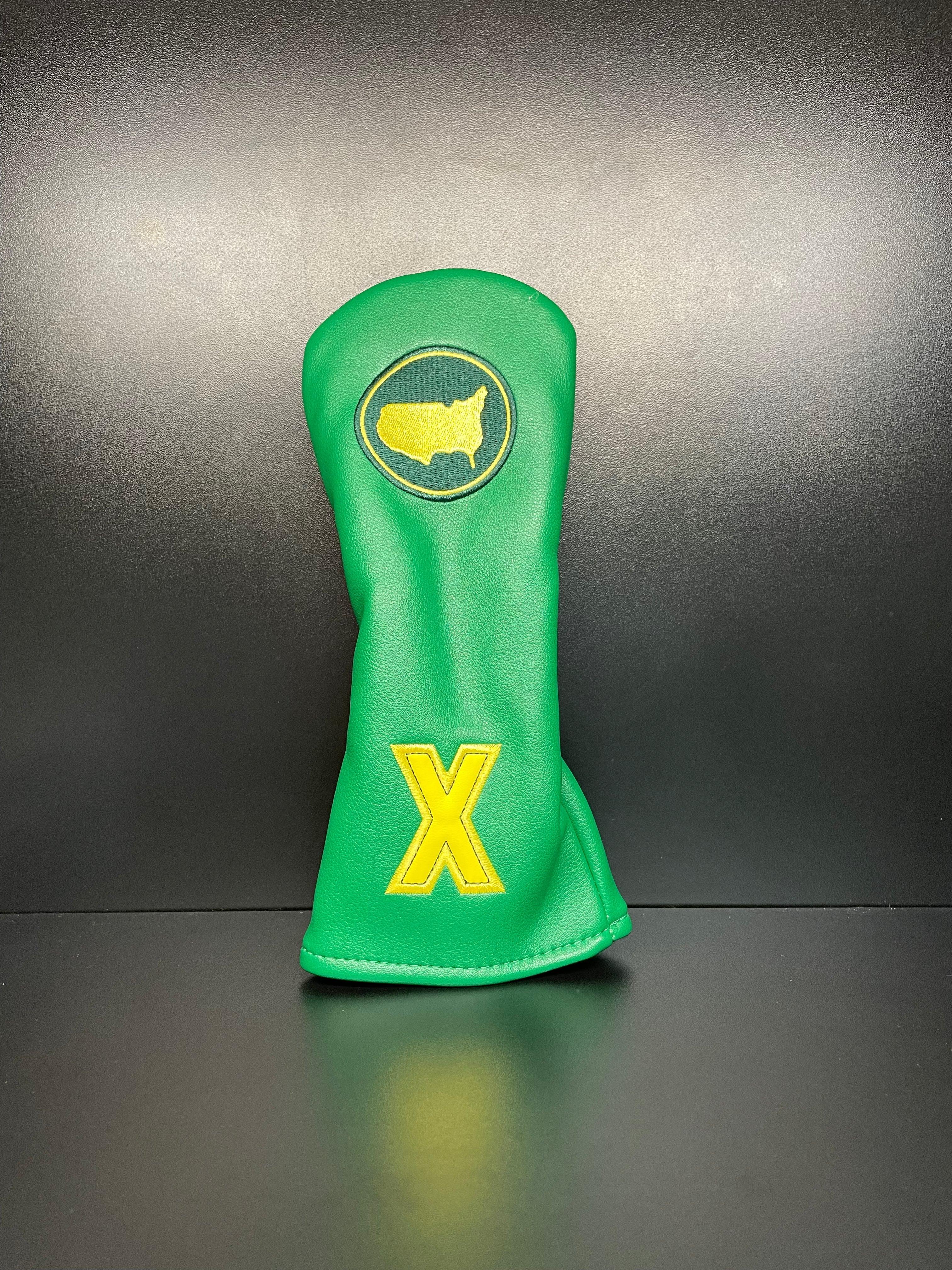 Golf club headcover with intricate embroidery by ParWestGolf, designed to protect and stylishly personalize your golf clubs.