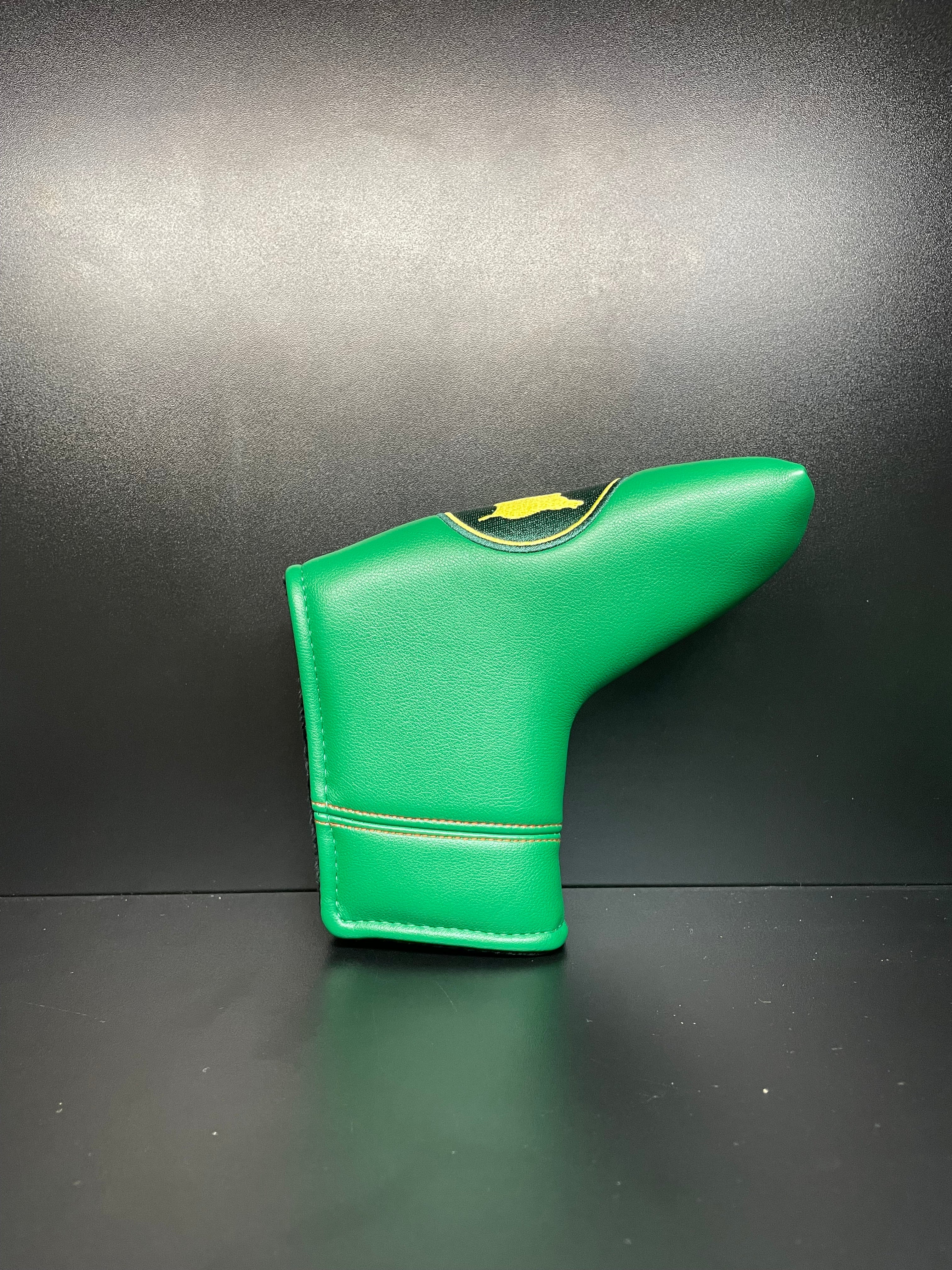 Golf club headcover with intricate embroidery by ParWestGolf, designed to protect and style your golf clubs.