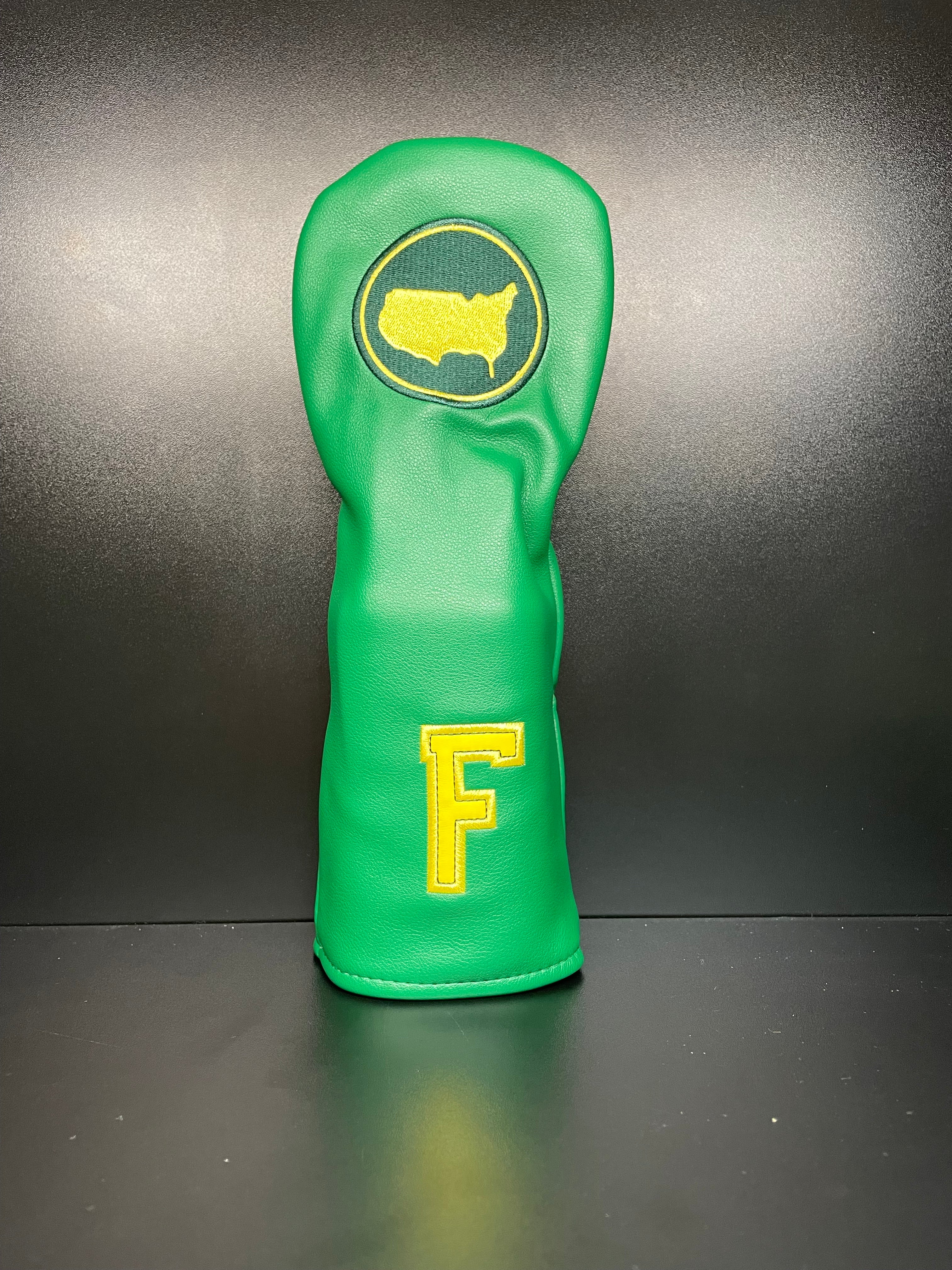 Golf club headcover with intricate embroidery by ParWestGolf, designed to protect and personalize your golf clubs.