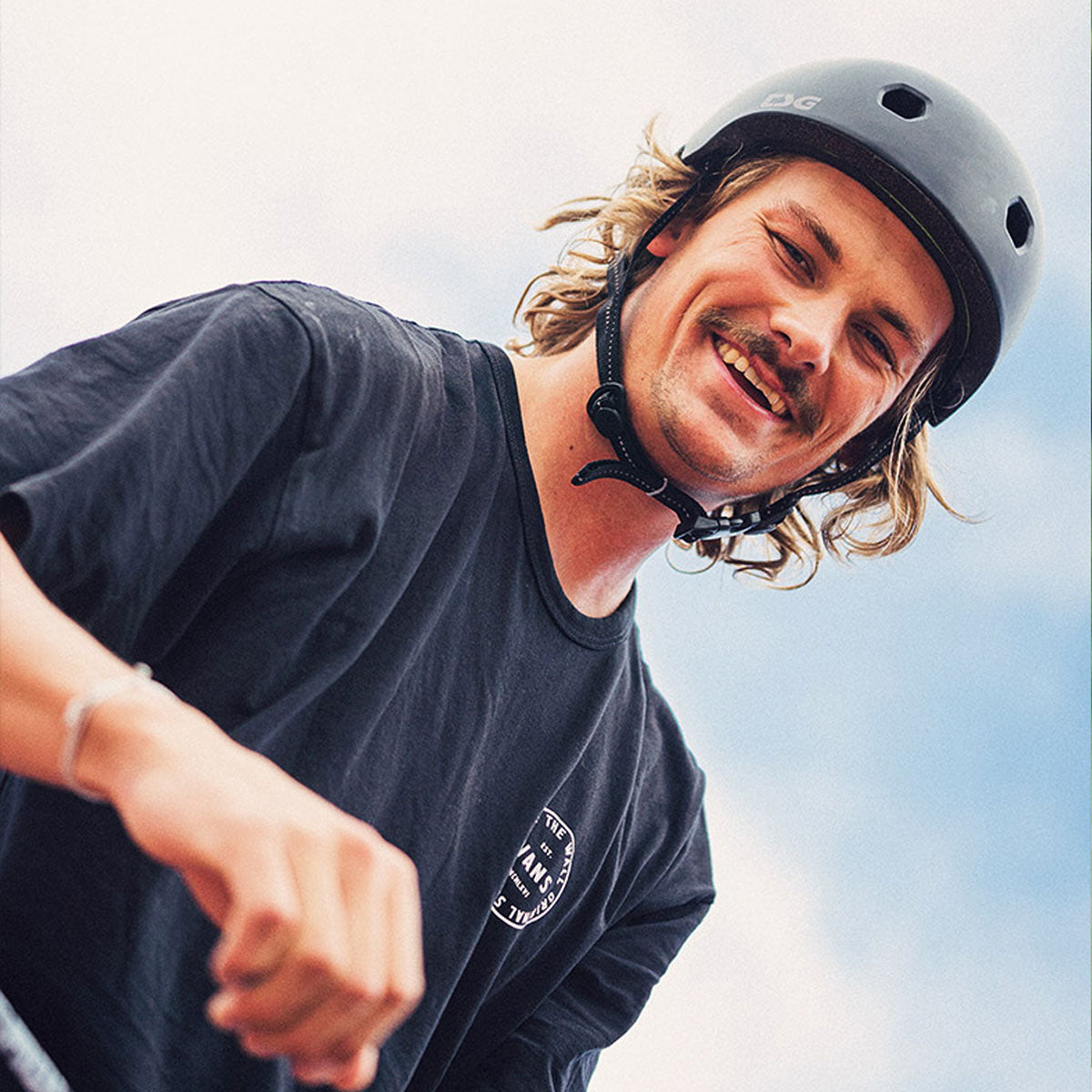 ZEITBIKE TSG Meta helmet in black with sleek design, adjustable straps, and ventilation for safety and comfort.