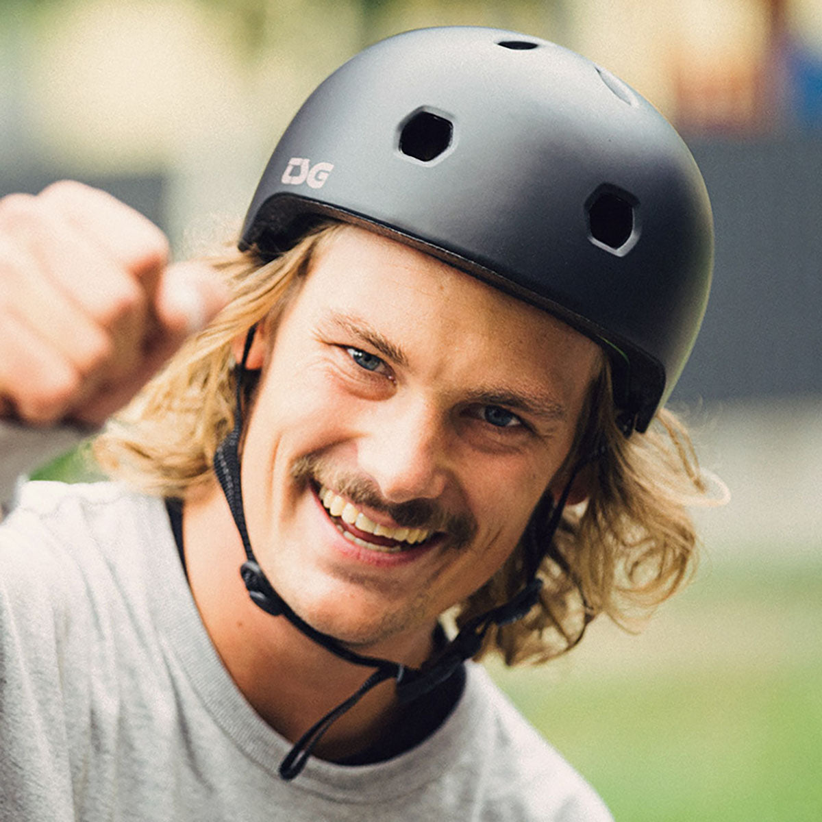 ZEITBIKE TSG Meta helmet in matte black with adjustable straps and ventilation for safety and comfort during cycling.