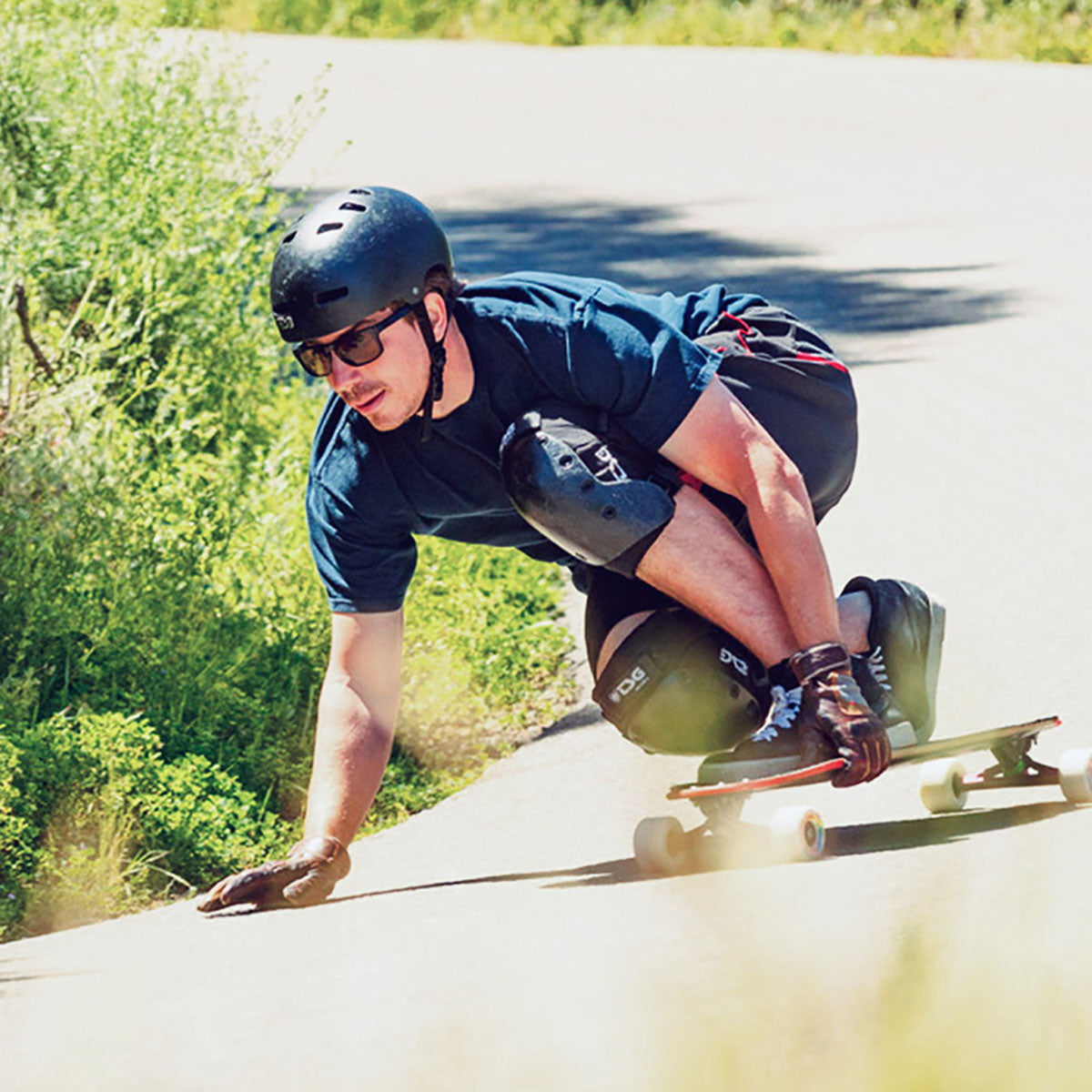 ZEITBIKE TSG Kneepad Sk8 DHP'S skate protective pads in black with adjustable straps, designed for skateboarding safety.