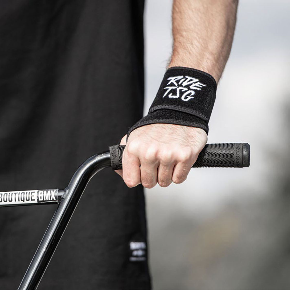 ZEITBIKE TSG wrist brace, protective pad for wrist support, shown in black with adjustable straps and padding for comfort.