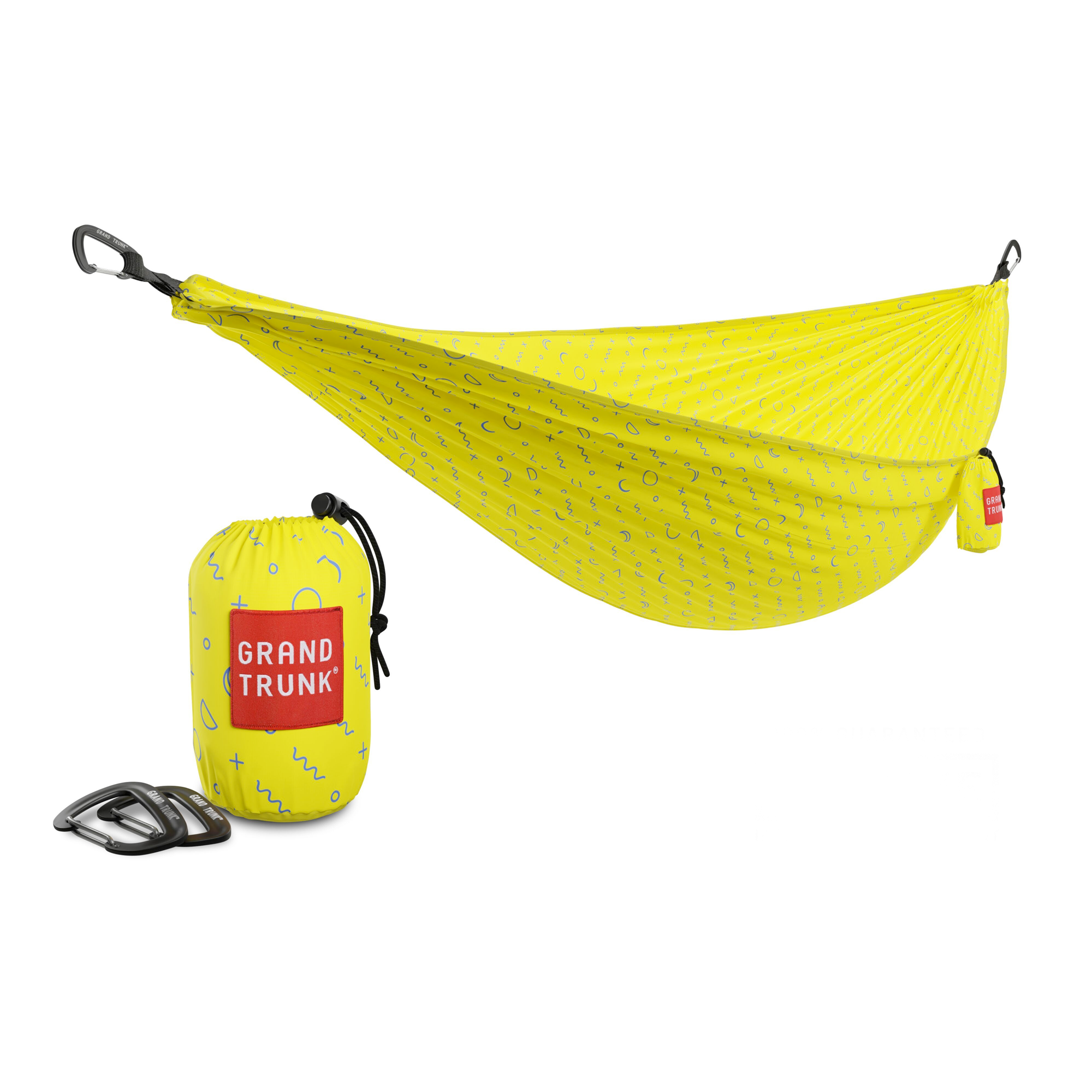 GrandTrunk TRUNKTECH™ hammock with lightweight, durable fabric, shown hanging outdoors for relaxing and camping use.