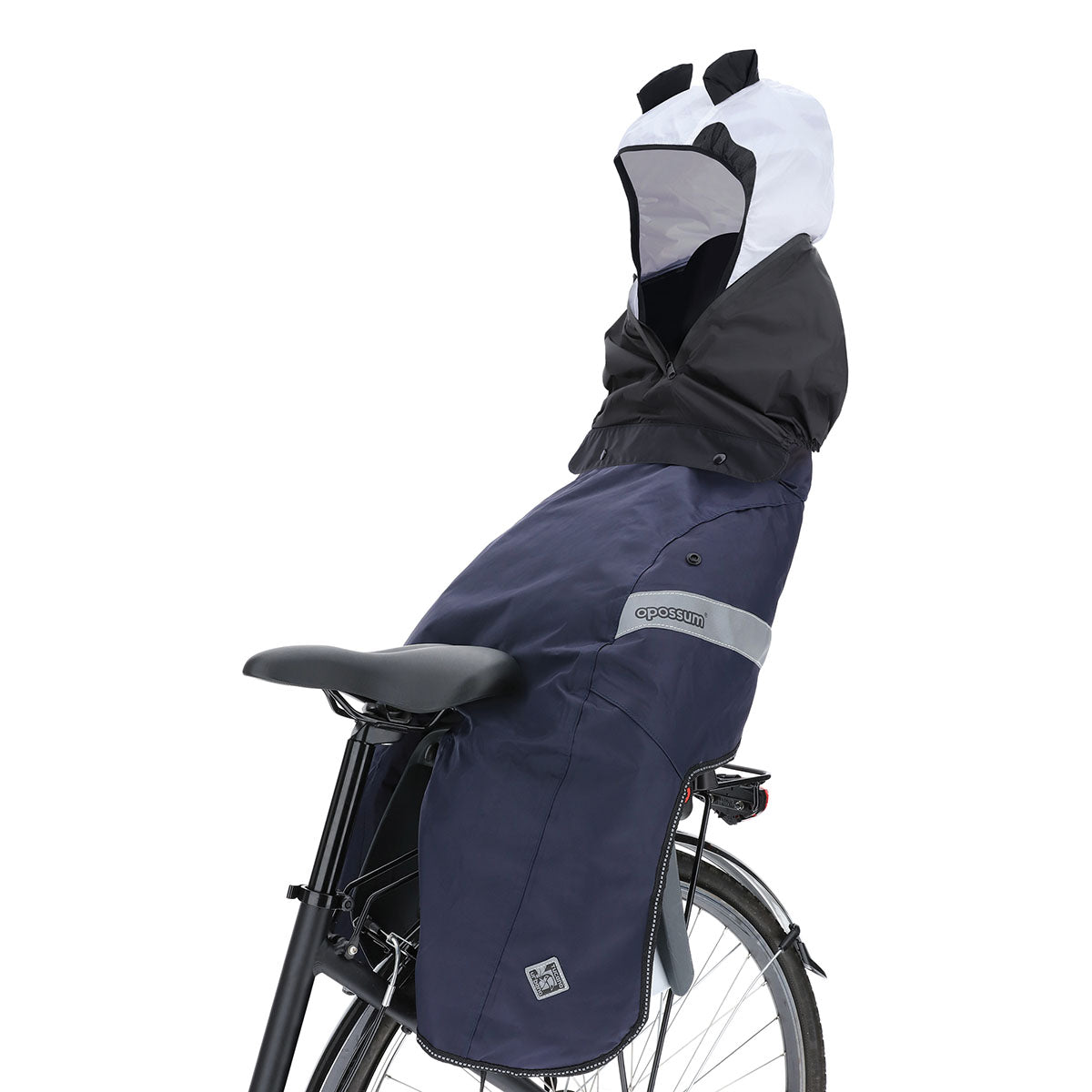 ZEITBIKE Tucano Urbano rainproof cape body hood, waterproof and protective, shown on a motorcycle rider in a natural outdoor setting.