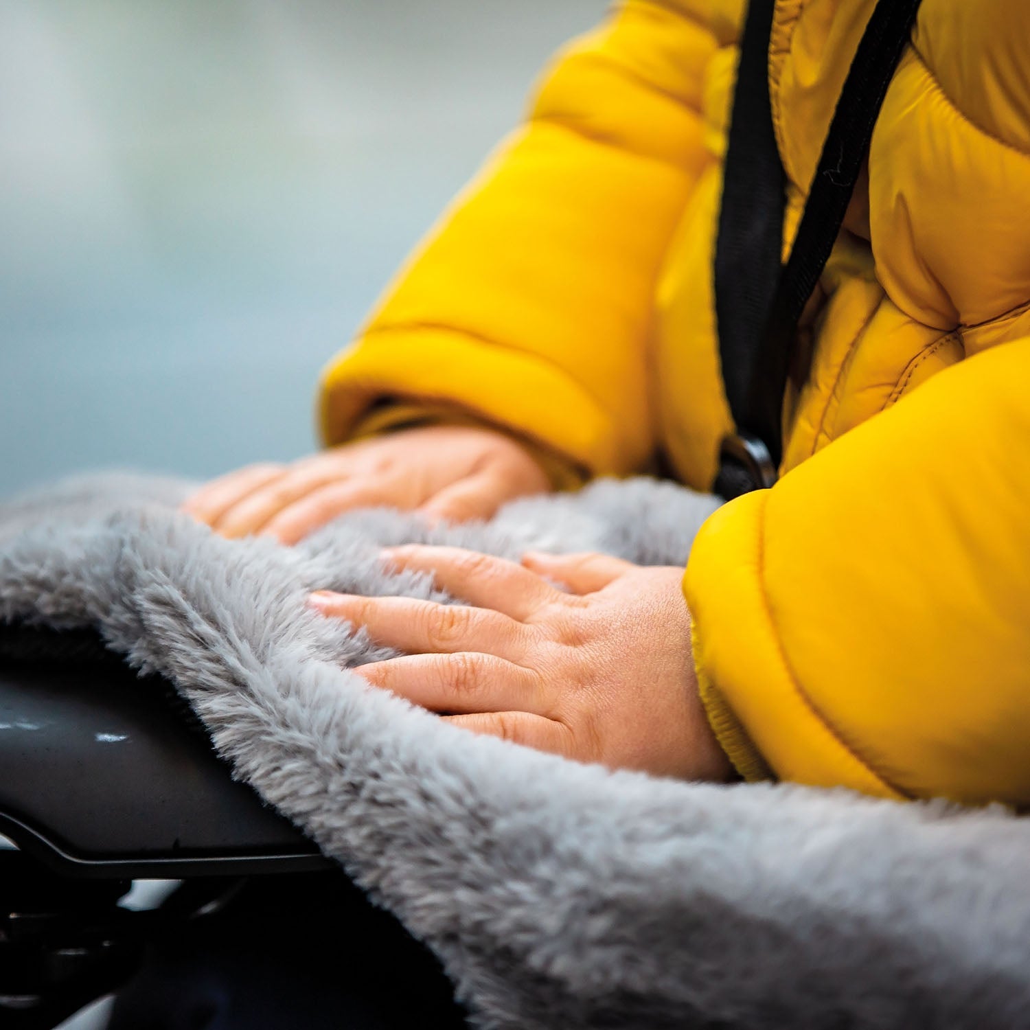 ZEITBIKE Tucano Urbano thermal child bike seat rain cover with hood, designed for all-weather cycling protection.
