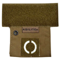 Tan HCC Tactical tourniquet holder designed for tactical gear, featuring secure attachment and durable construction.