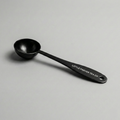 Little Prayer Tea Spoon from Little Prayer Tea Company, elegantly designed for measuring loose tea leaves.