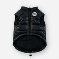 Black ThermaPuffer vest by The Wild Paw, insulated puffer vest with a sleek design, suitable for outdoor warmth and style.